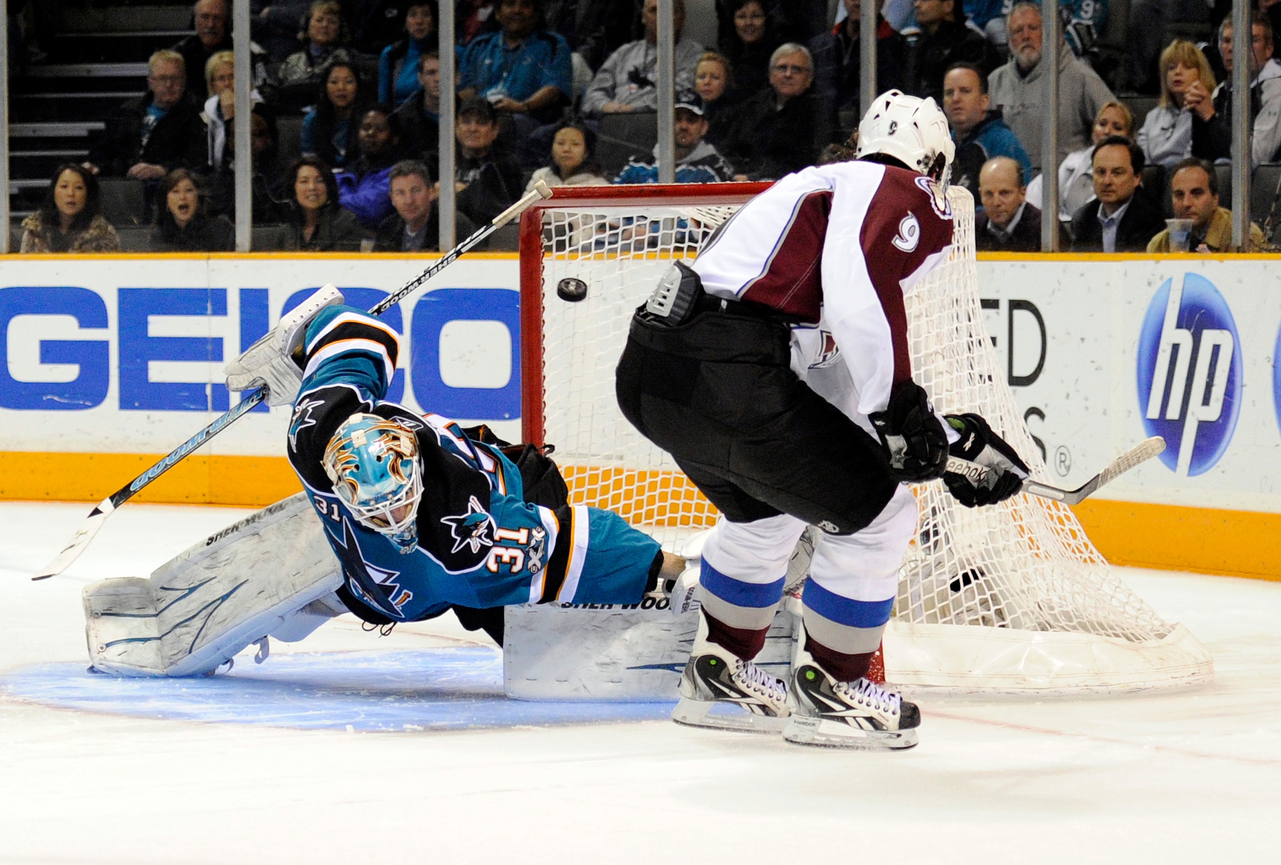 SAN JOSE, CA - MARCH 1: Antti Niemi #31 of the San Jose Sharks deflects the shot of Matt Duchene #9 of the Colorado Avalanche in a shootout during an NHL hockey game at the HP Pavilion on March 1, 2011 in San Jose, California. The Sharks won the game in a