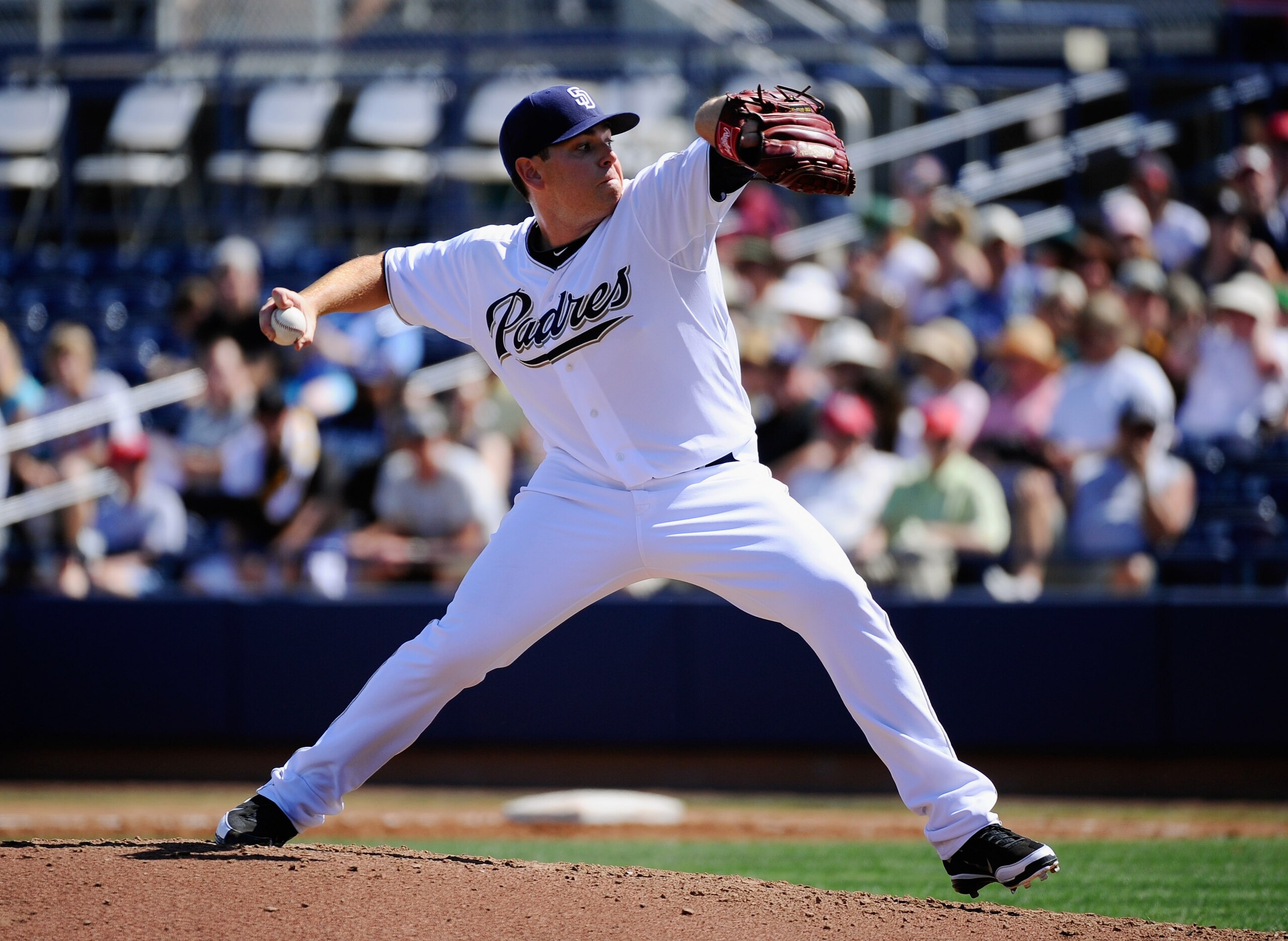 PEORIA, AZ - MARCH 13:  Pitcher Tim Stauffer #46 of the San Diego Padres throws a pitch against the Cleveland Indians during the third inning of the spring training baseball game at Peoria Stadium on March 13, 2011 in Peoria, Arizona.  (Photo by Kevork Dj