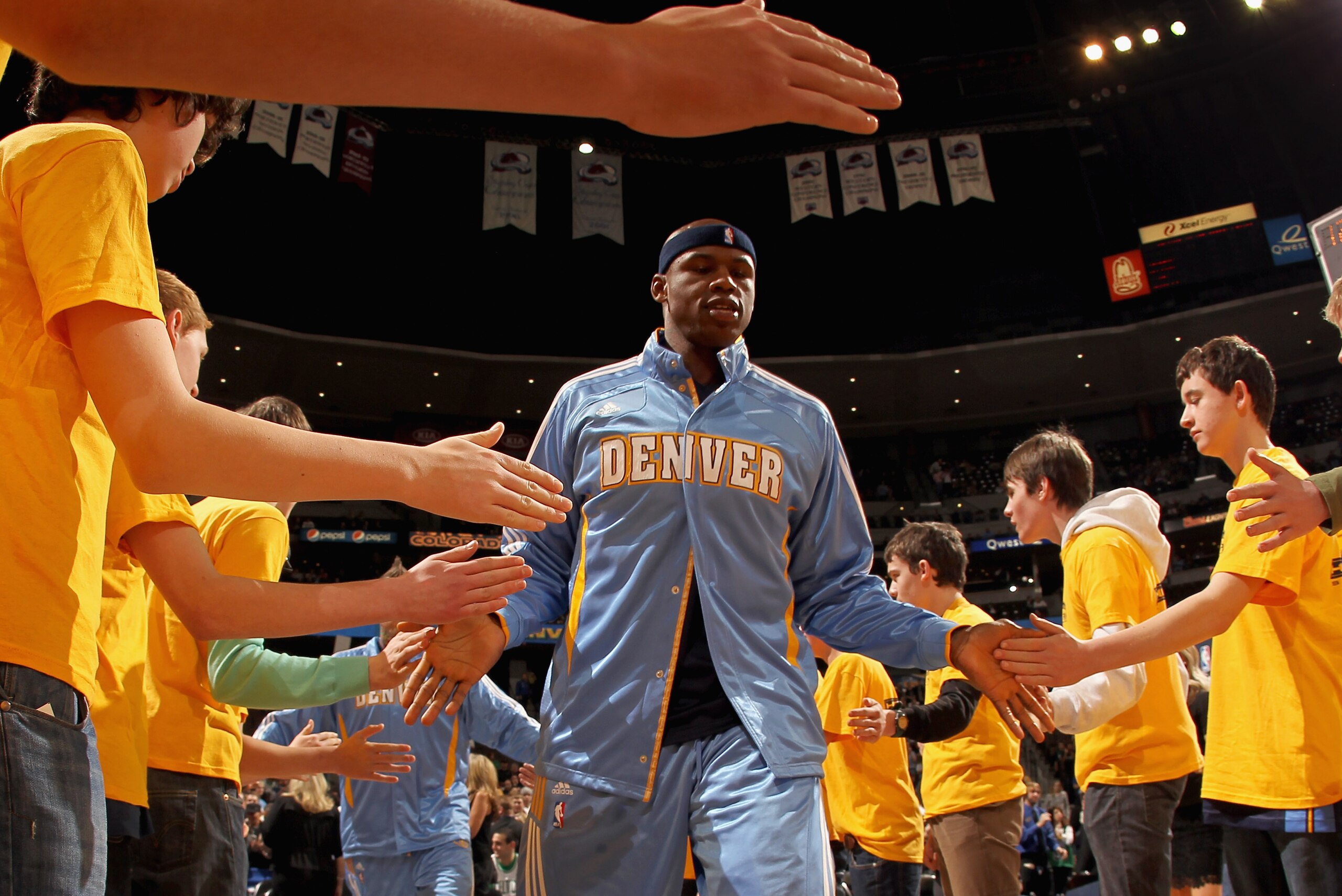 DENVER, CO - FEBRUARY 24: Al Harrington #7 of the Denver Nuggets is high fived by fans as he takes the court to face the Boston Celtics during NBA action at the Pepsi Center on February 24, 2011 in Denver, Colorado. The Nuggets defeated the Celtics 89-75 DENVER, CO - FEBRUARY 24: Al Harrington #7 of the Denver Nuggets is high fived by fans as he takes the court to face the Boston Celtics during NBA action at the Pepsi Center on February 24, 2011 in Denver, Colorado. The Nuggets defeated the Celtics 89-75