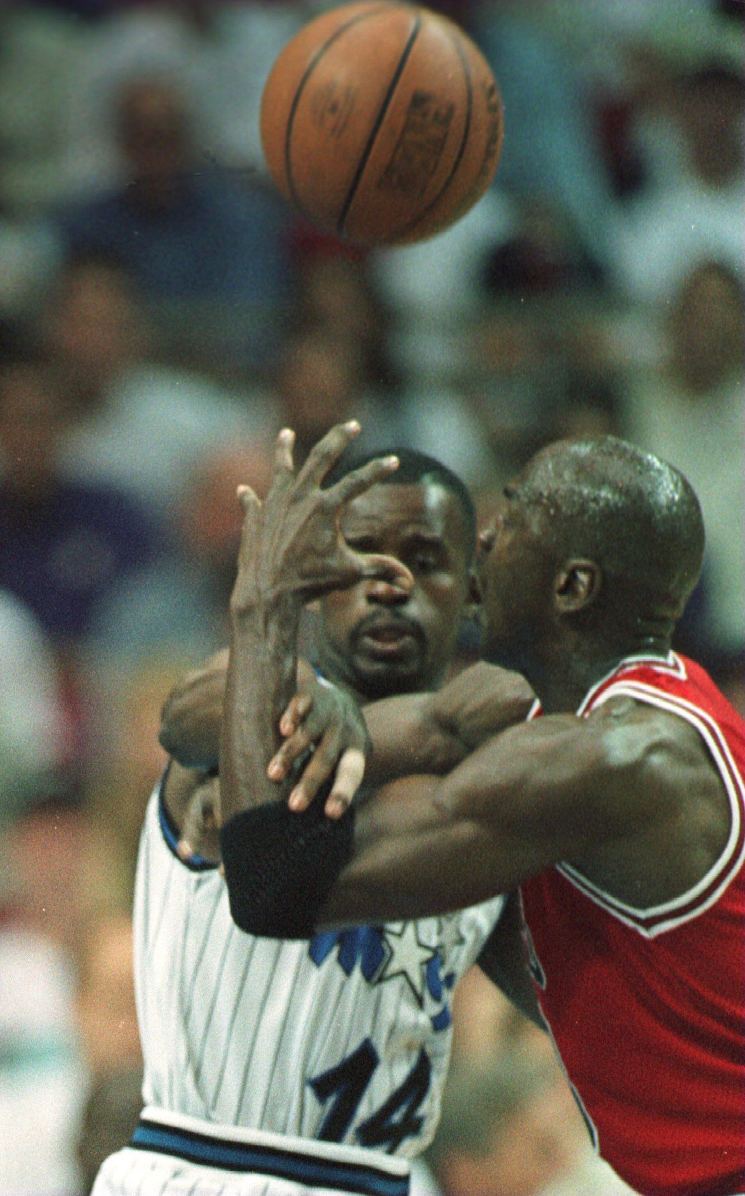 25 May 1996: Guard Michael Jordan of the Chicago Bulls (right) puts a hand in the face of guard Anthony Bowie of the Orlando Magic during game 3 of the Eastern Conference Finals at the Orlando Arena in Orlando, Florida. Mandatory Credit: Jonathan Dan 25 May 1996: Guard Michael Jordan of the Chicago Bulls (right) puts a hand in the face of guard Anthony Bowie of the Orlando Magic during game 3 of the Eastern Conference Finals at the Orlando Arena in Orlando, Florida. Mandatory Credit: Jonathan Dan
