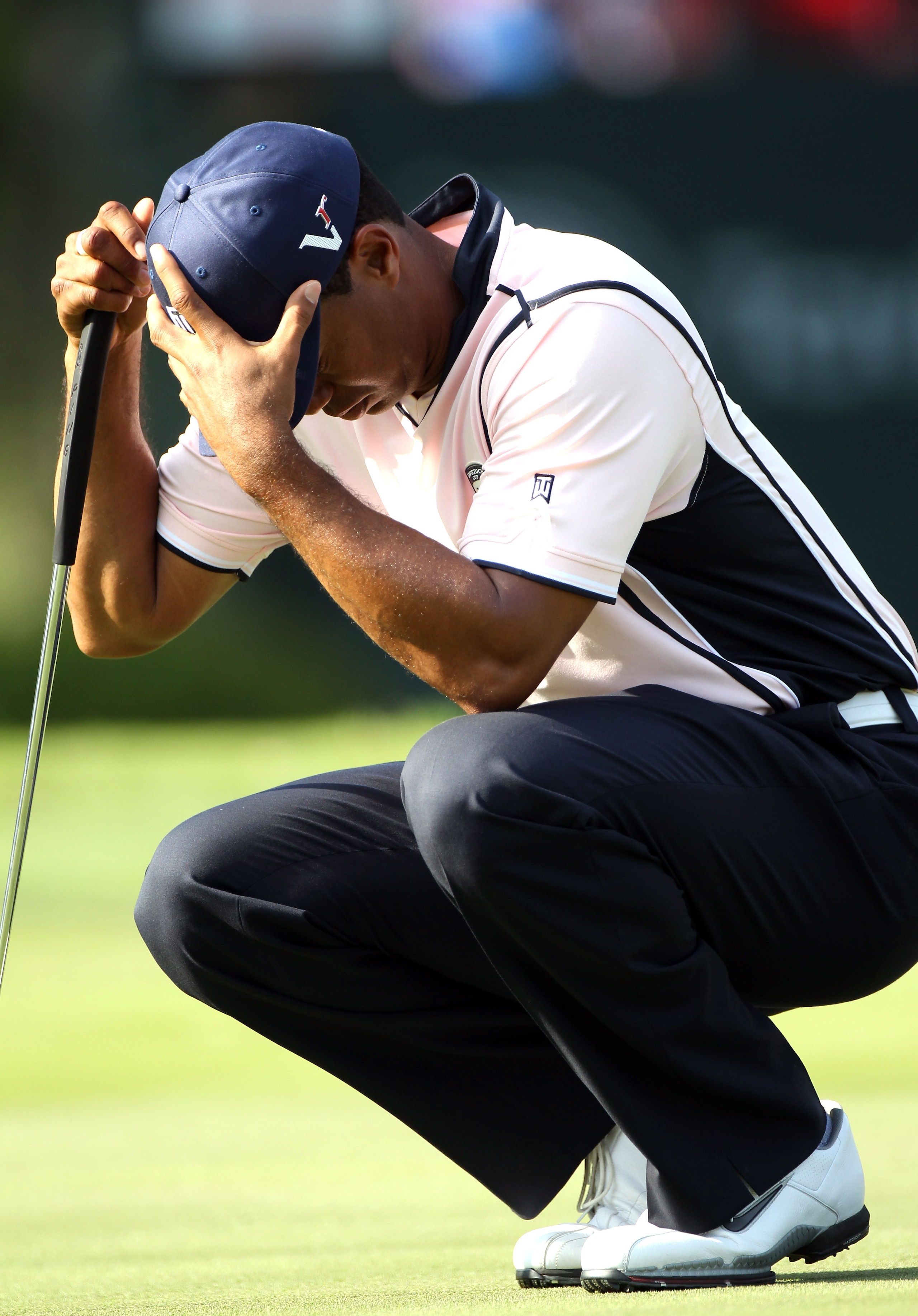 WINDERMERE, FL - MARCH 15:  Tiger Woods waits to play a shot on the 18th hole during the second day of the Tavistock Cup at Isleworth Golf & Country Club on March 15, 2011 in Windermere, Florida.  (Photo by Sam Greenwood/Getty Images)