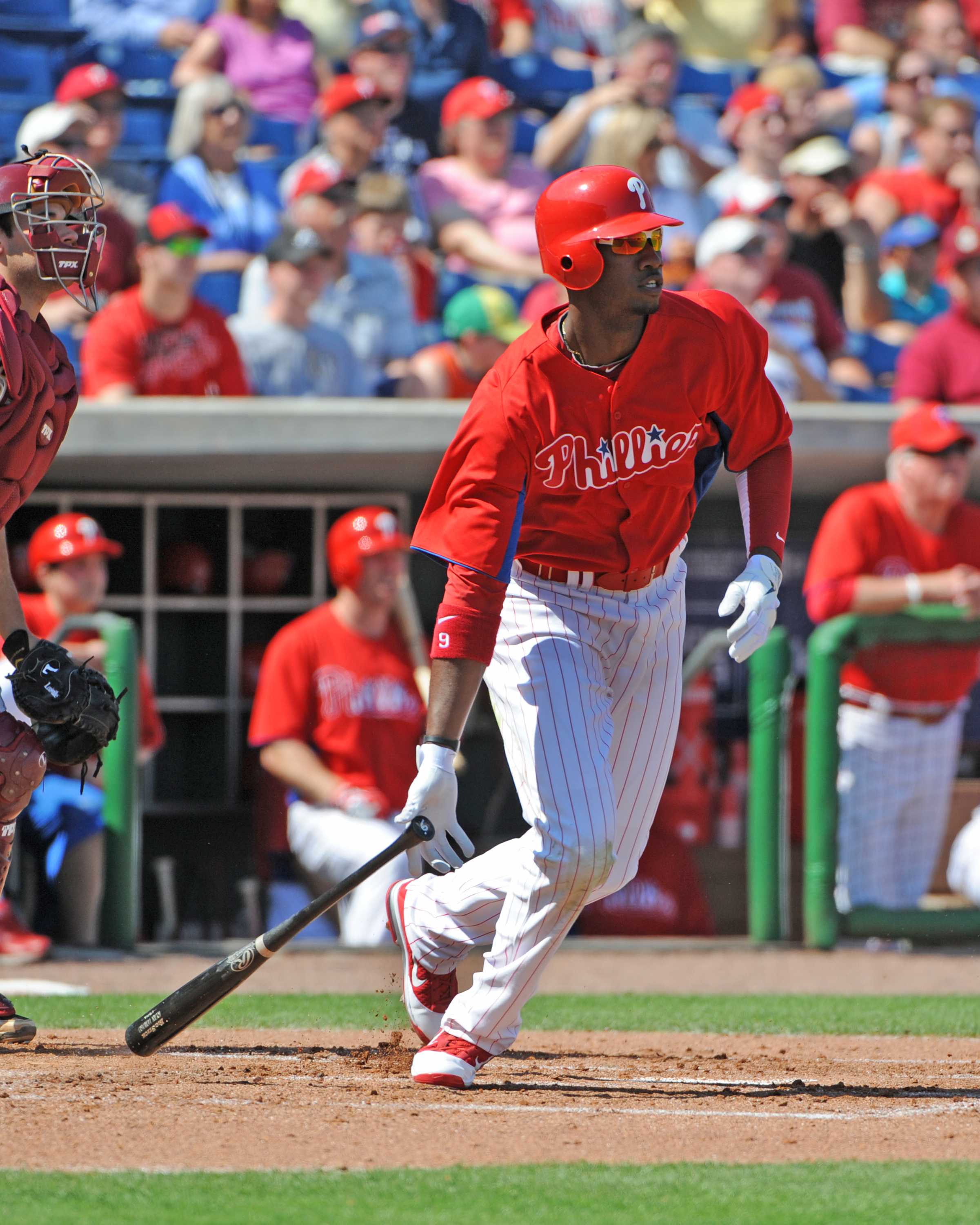 CLEARWATER, FL - FEBRUARY 24:  Outfielder Domonic Brown #9 of the Philadelphia Phillies singles in the first inning against the Florida State Seminoles February 24, 2011 at Bright House Field in Clearwater, Florida.  (Photo by Al Messerschmidt/Getty Image