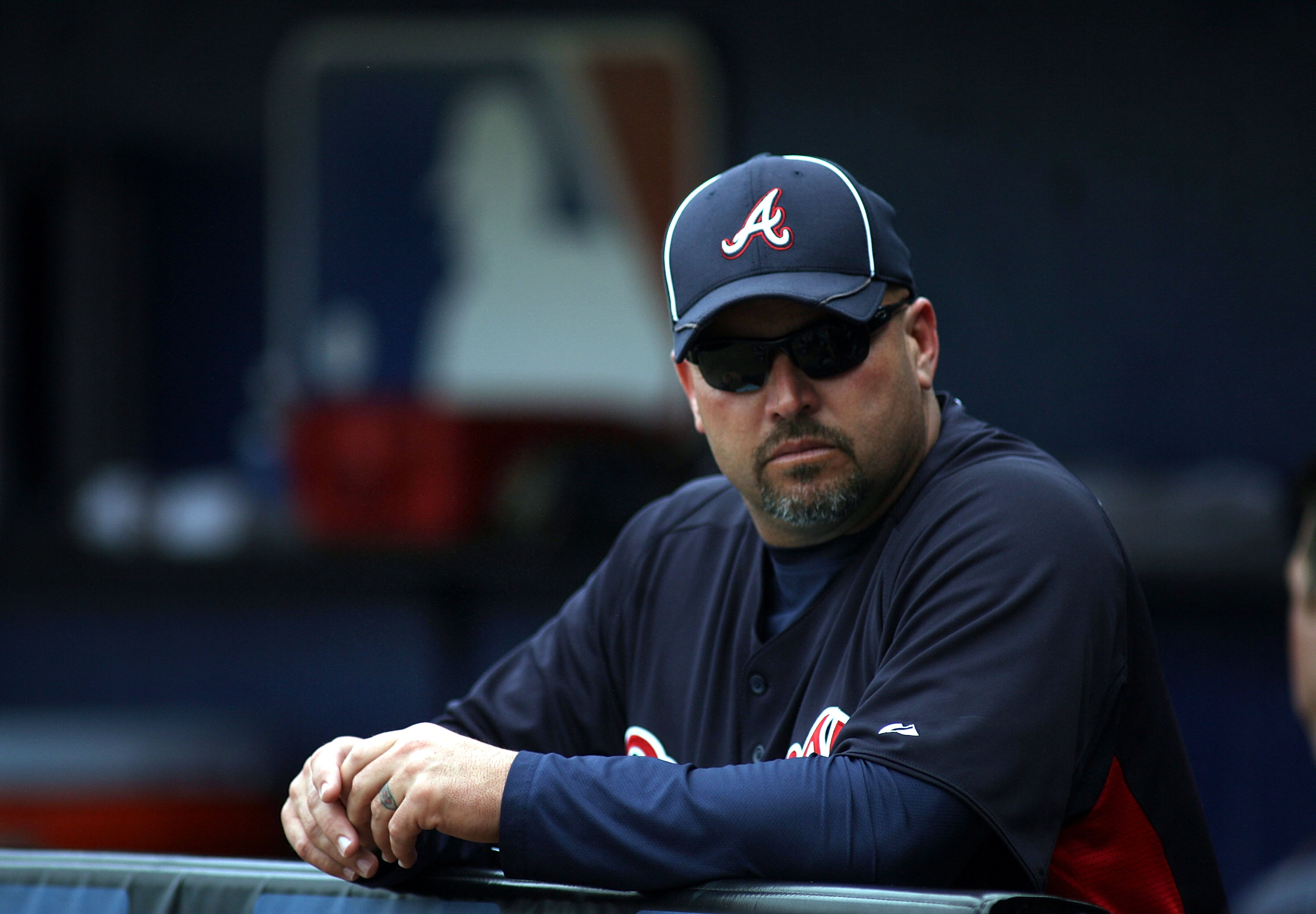 PORT ST. LUCIE, FL - FEBRUARY 26:  Manager Freddie Gonzalez of the Atlanta Braves watches  prior to playing against the New York Mets at Digital Domain Park on February 26, 2011 in Port St. Lucie, Florida.  (Photo by Marc Serota/Getty Images)