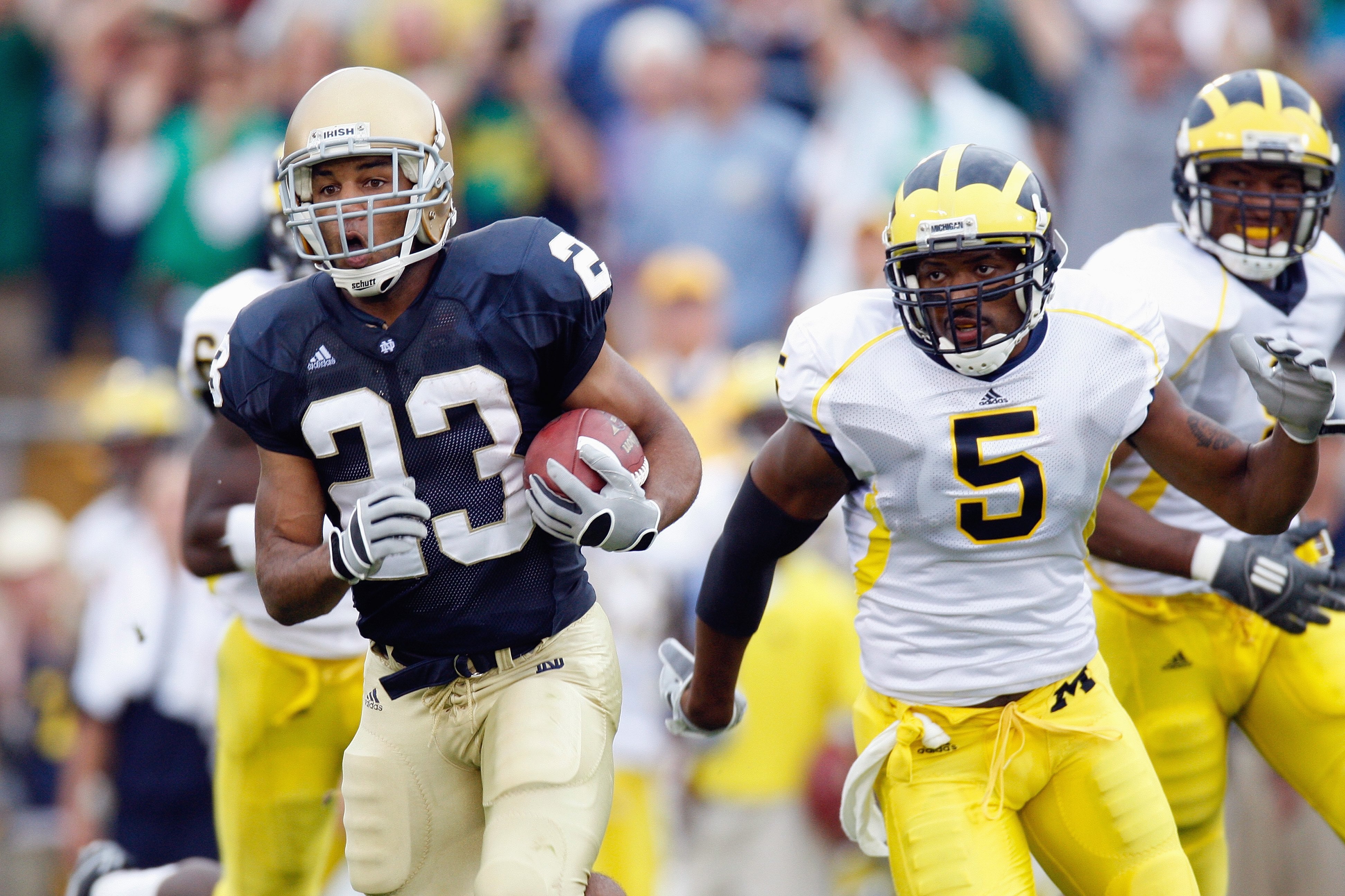SOUTH BEND,IN - SEPTEMBER 13:  Golden Tate #23 of the Notre Dame Fighting Irish carries the ball during the game against the Michigan Wolverines on September 13, 2008 at Notre Dame Stadium in South Bend, Indiana. (Photo by: Gregory Shamus/Getty Images)