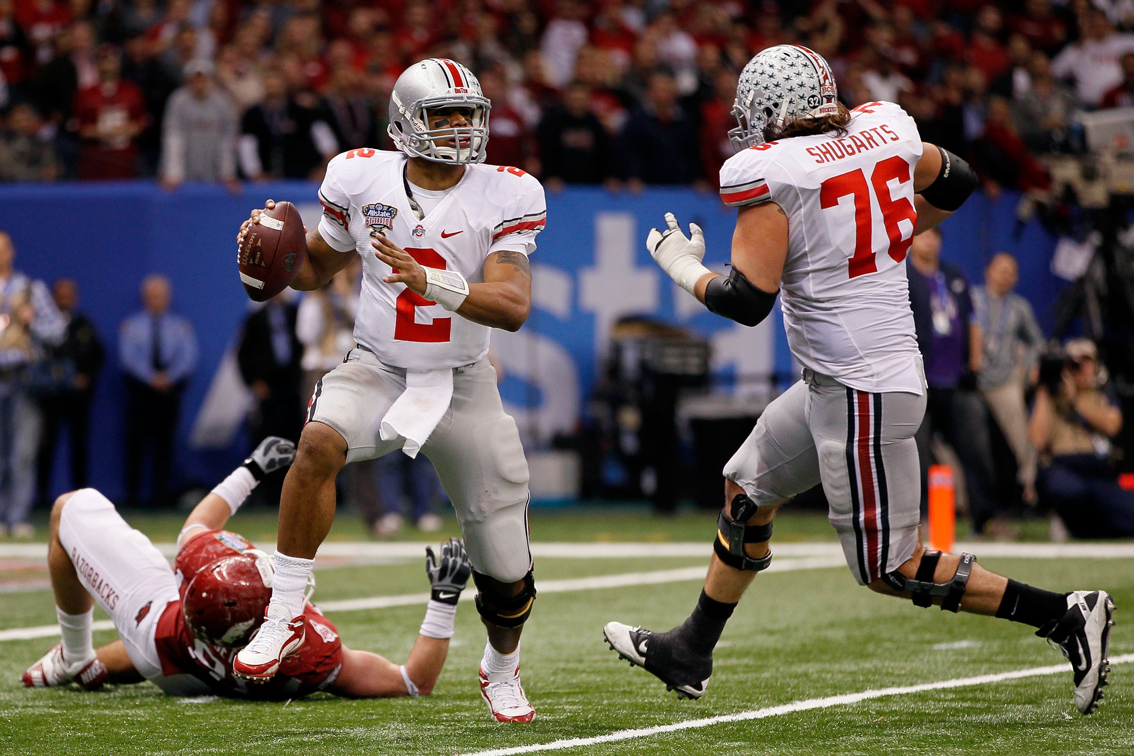 NEW ORLEANS, LA - JANUARY 04: Quarterback Terrelle Pryor #2 of the Ohio State Buckeyes looks to run against the Arkansas Razorbacks during the Allstate Sugar Bowl at the Louisiana Superdome on January 4, 2011 in New Orleans, Louisiana. (Photo by Kevin C NEW ORLEANS, LA - JANUARY 04: Quarterback Terrelle Pryor #2 of the Ohio State Buckeyes looks to run against the Arkansas Razorbacks during the Allstate Sugar Bowl at the Louisiana Superdome on January 4, 2011 in New Orleans, Louisiana. (Photo by Kevin C