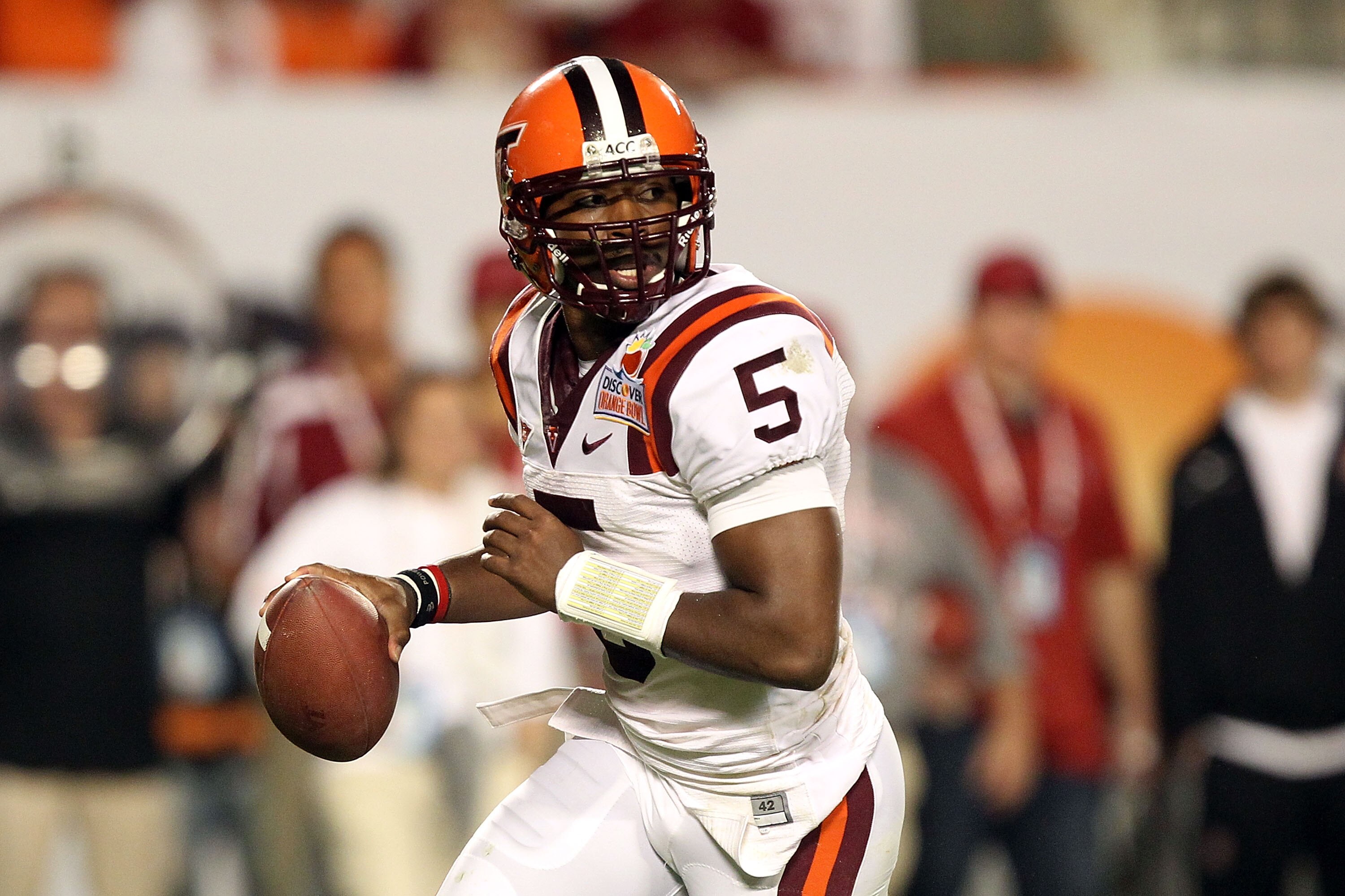 MIAMI, FL - JANUARY 03:  Tyrod Taylor #5 of the Virginia Tech Hokies looks to pass against the Stanford Cardinal during the 2011 Discover Orange Bowl at Sun Life Stadium on January 3, 2011 in Miami, Florida. Stanford won 40-12.  (Photo by Streeter Lecka/G