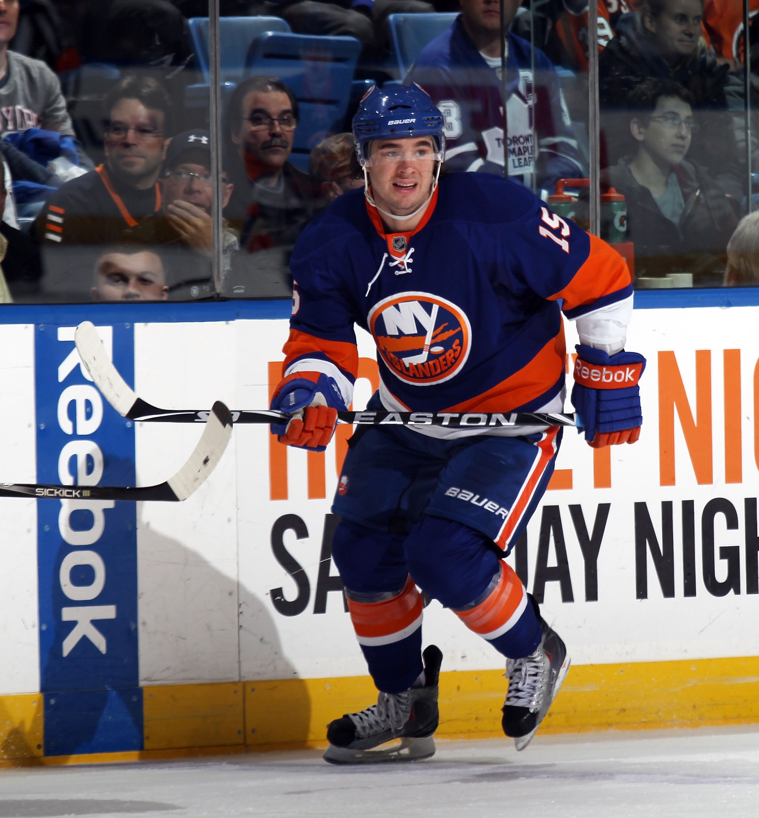 UNIONDALE, NY - MARCH 08:  P.A. Parenteau #15 of the New York Islanders skates against the Toronto Maple Leafs at the Nassau Coliseum on March 8, 2011 in Uniondale, New York. The Islanders defeated the Leafs 4-3 in overtime.  (Photo by Bruce Bennett/Getty