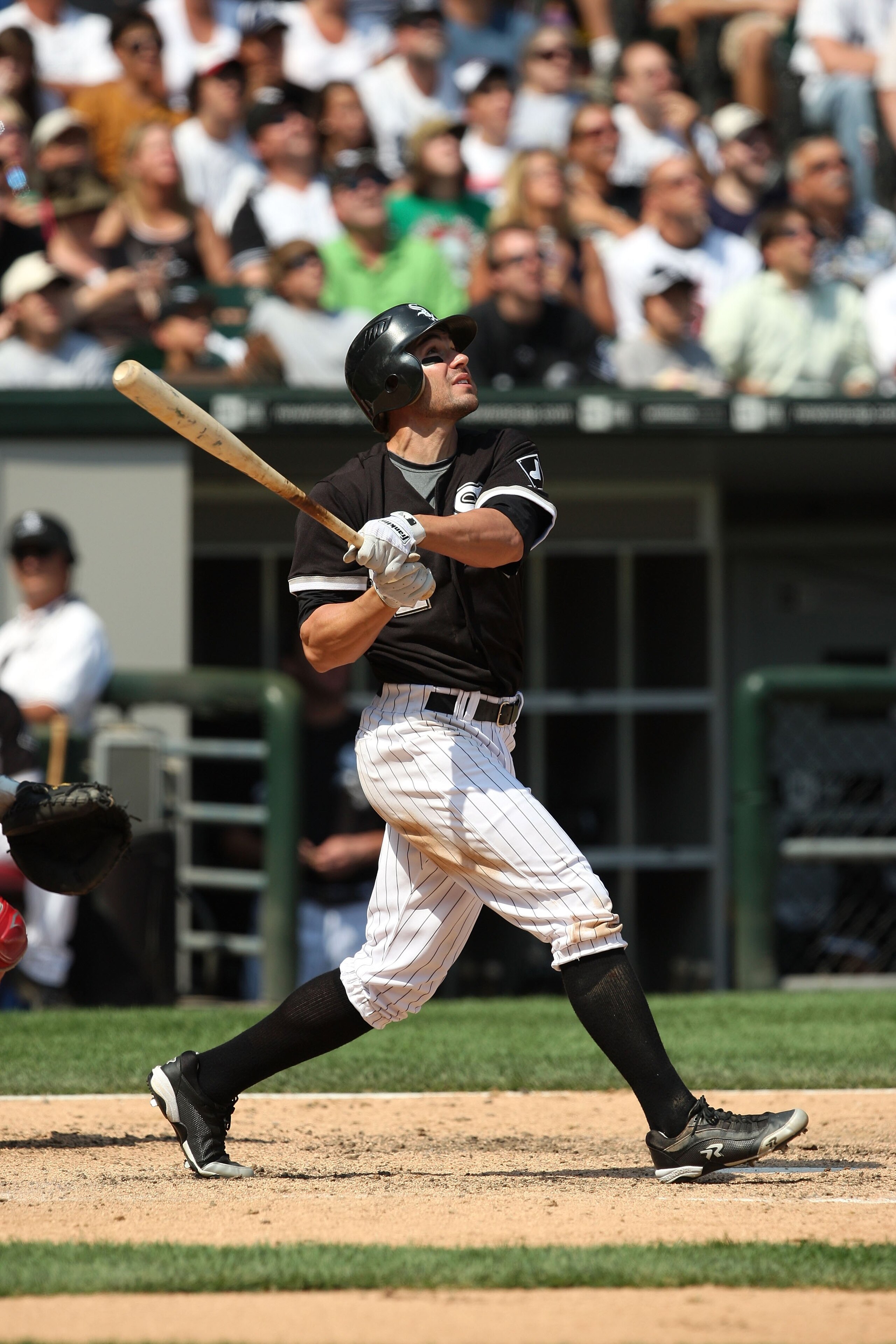 CHICAGO - AUGUST 06:  Scott Podsednik #22 of the Chicago White Sox bats against the Los Angeles Angels of Anaheim at U.S. Cellular Field on August 6, 2009 in Chicago, Illinois.  (Photo by Jonathan Daniel/Getty Images)