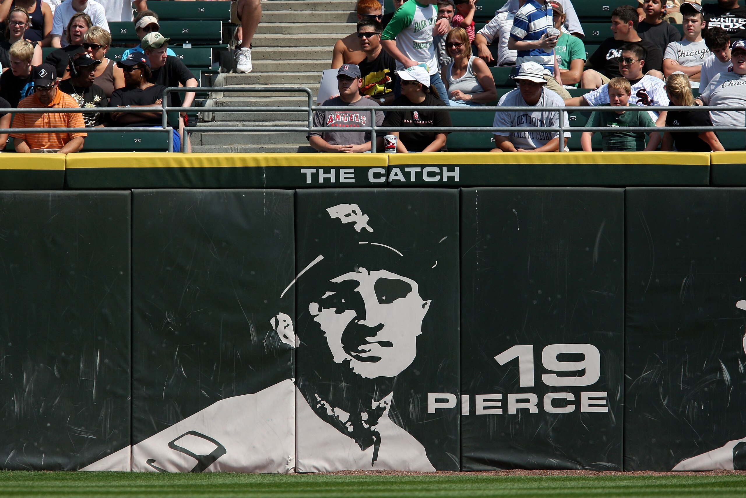 CHICAGO - AUGUST 06:  The words 'The Catch' are seen above the likeness of former Chicago White Sox player Billy Pierce #19 against the Los Angeles Angels of Anaheim at U.S. Cellular Field on August 6, 2009 in Chicago, Illinois. 'The Catch' referes to the