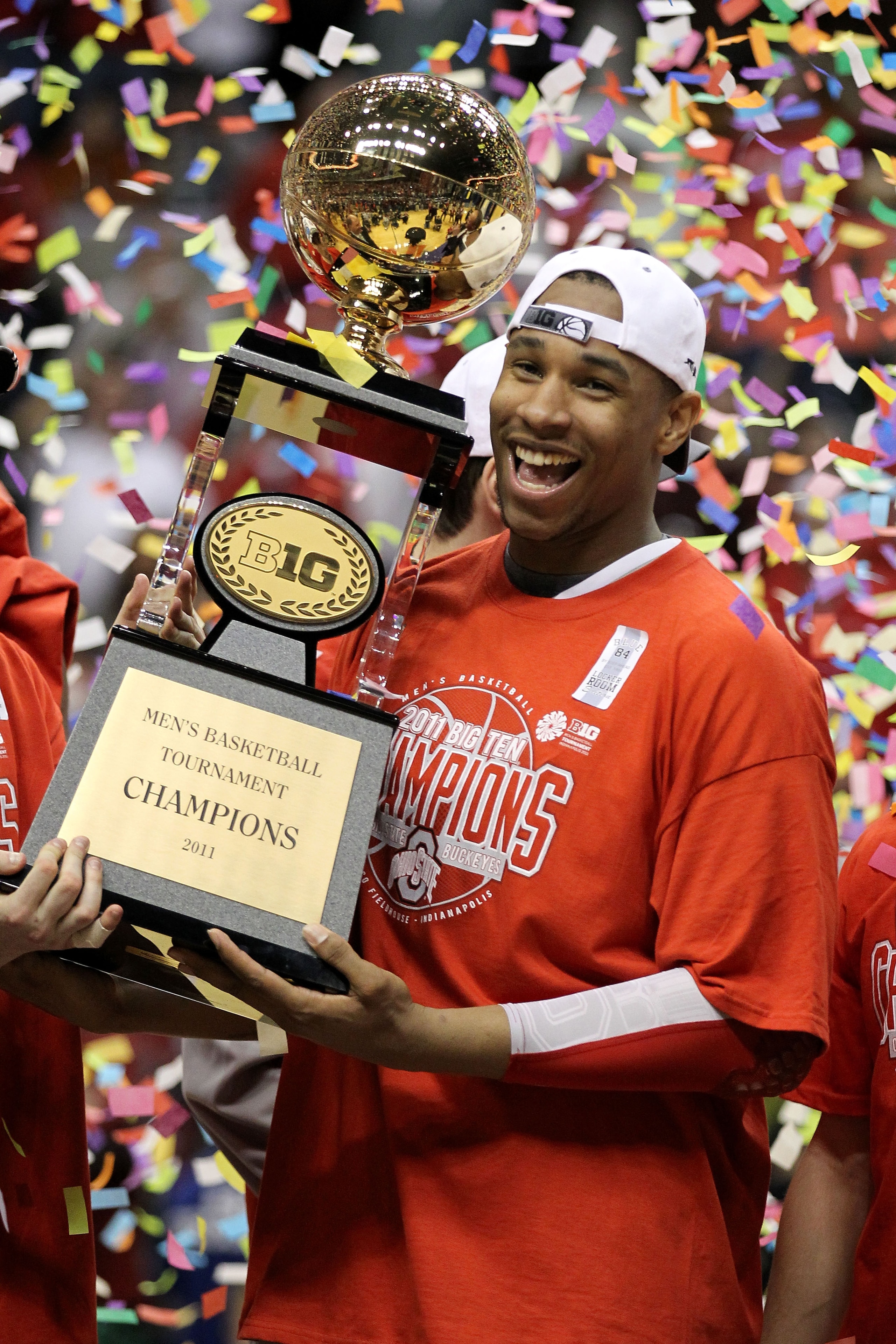 INDIANAPOLIS, IN - MARCH 13:  Jared Sullinger #0 of the Ohio State Buckeyes celebrates with the Big Ten Championship trophy after OHio State won 71-60 against the Penn State Nittany Lions during the championship game of the 2011 Big Ten Men's Basketball T
