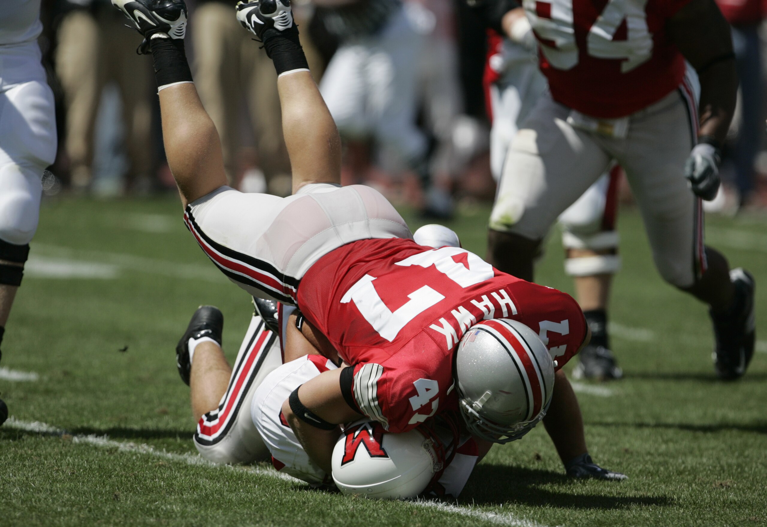 COLUMBUS, OH - SEPTEMBER 3:  Linebacker A.J. Hawk #47 of the Ohio State Buckeyes makes a tackle against the Miami (OH) Redhawks on September 3, 2005 at Ohio Stadium in Columbus, Ohio.  Ohio State defeated Miami (OH) 34-14.  (Photo by David Maxwell/Getty I