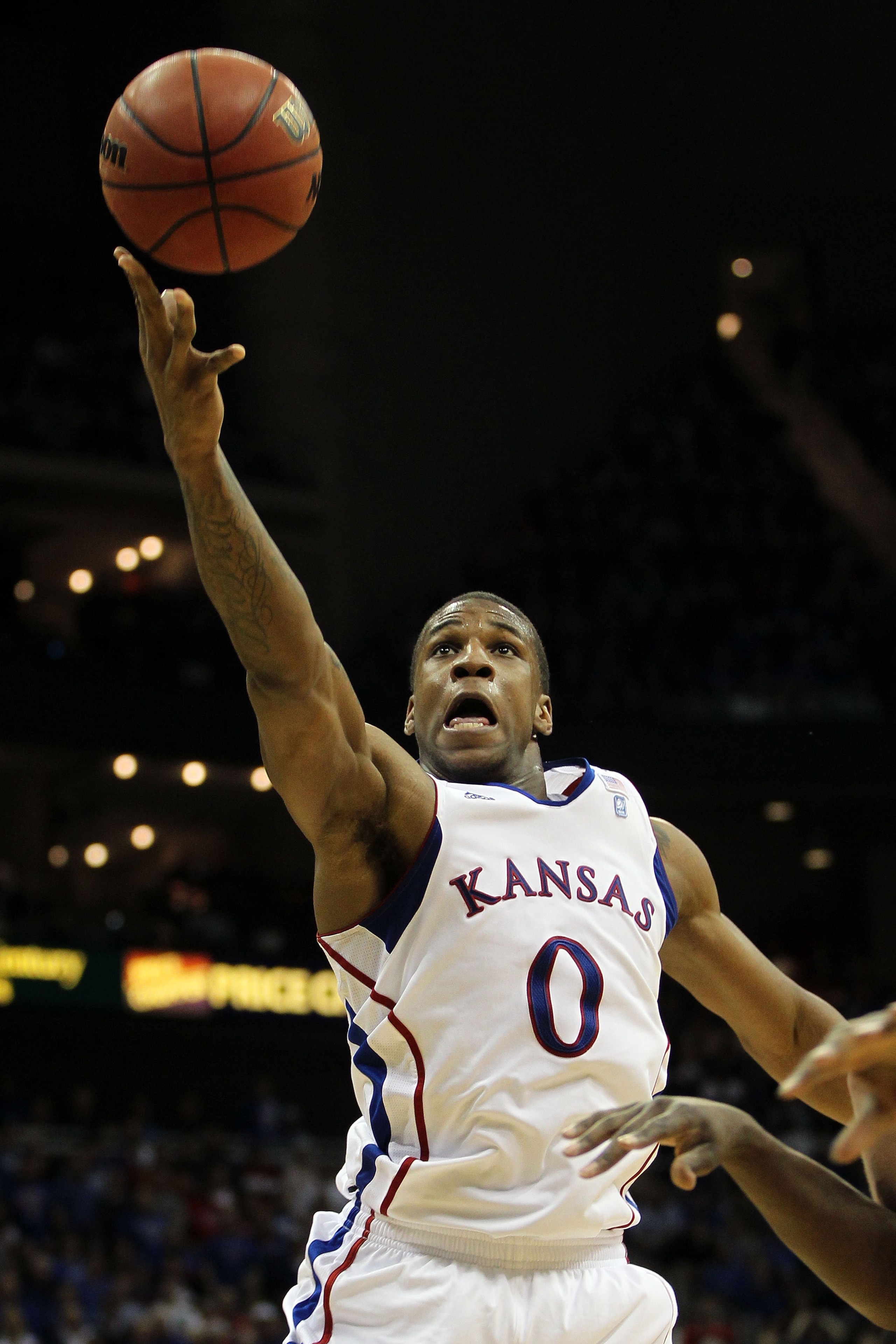 KANSAS CITY, MO - MARCH 12:  Thomas Robinson #0 of the Kansas Jayhawks takes a shot against the Texas Longhorns during the 2011 Phillips 66 Big 12 Men's Basketball Tournament championship game at Sprint Center on March 12, 2011 in Kansas City, Missouri.