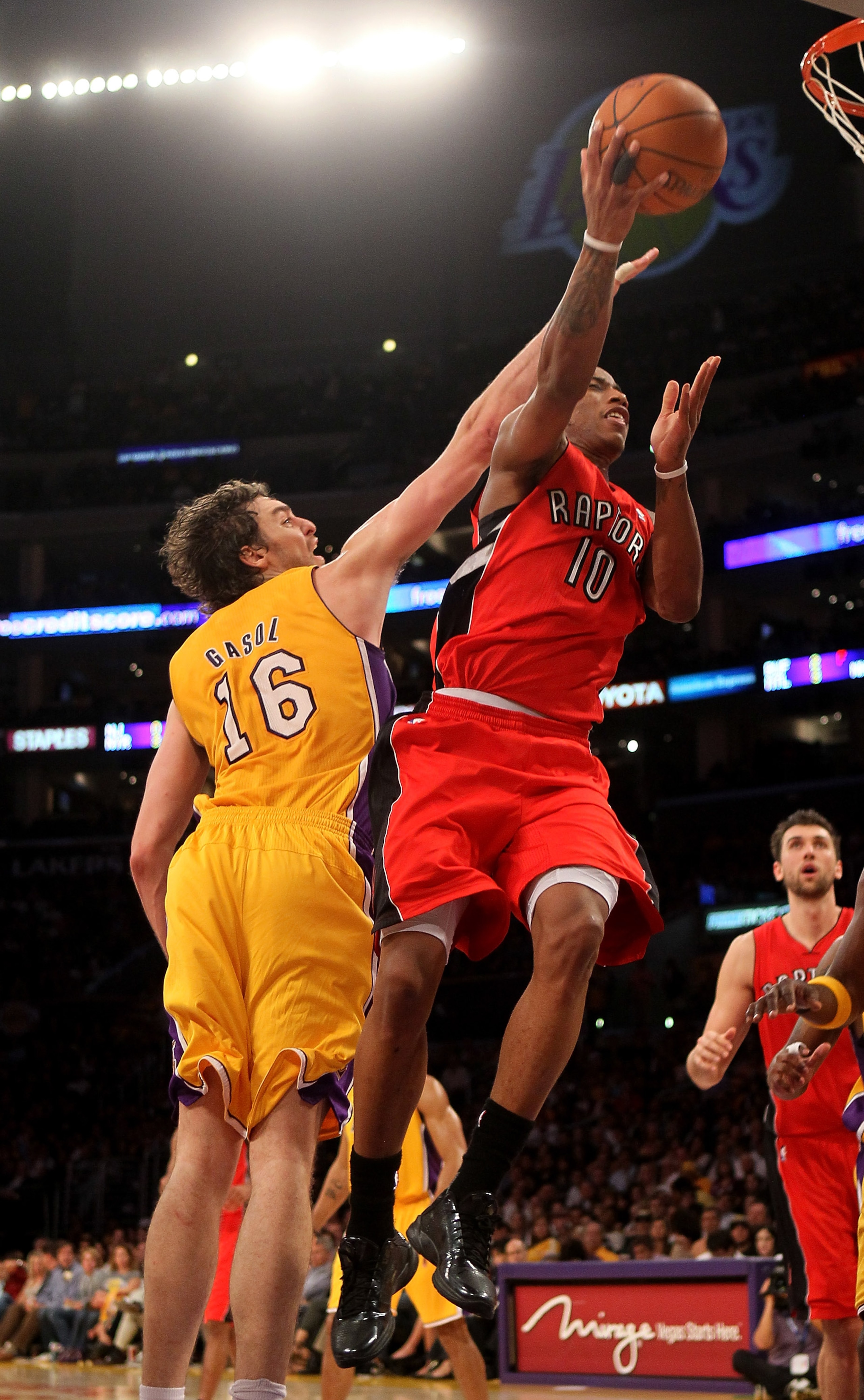 LOS ANGELES, CA - NOVEMBER 05:  DeMar DeRozan #10 of the Toronto Raptors goes up for a shot over Pau Gasol #16  of the Los Angeles Lakers at Staples Center on November 5, 2010 in Los Angeles, California.  The Lakers won 108-102.   NOTE TO USER: User expre