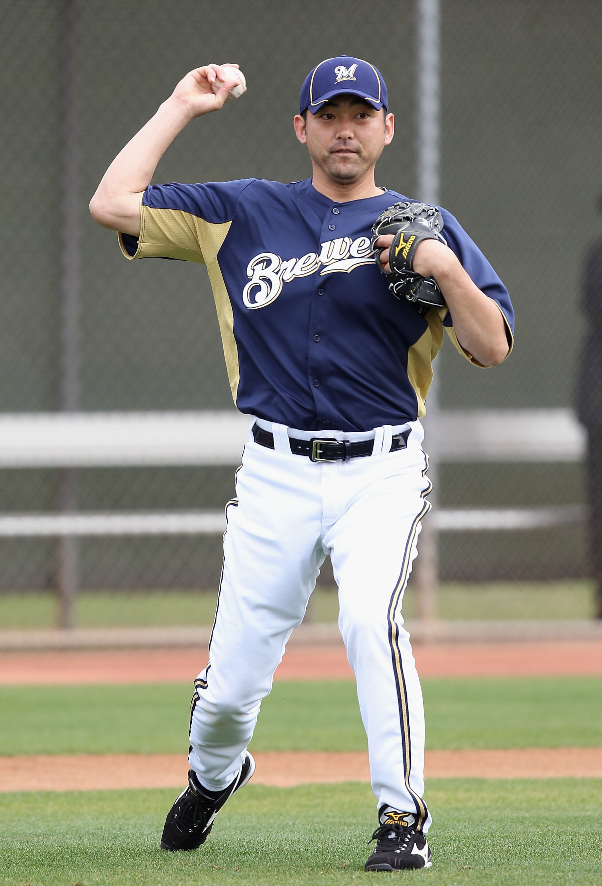 PHOENIX, AZ - FEBRUARY 18: Pitcher Takashi Saito #40 of the Milwaukee Brewers participates in fielding drills during a MLB spring training practice at Maryvale Baseball Park on February 18, 2011 in Phoenix, Arizona. (Photo by Christian Petersen/Getty Im PHOENIX, AZ - FEBRUARY 18: Pitcher Takashi Saito #40 of the Milwaukee Brewers participates in fielding drills during a MLB spring training practice at Maryvale Baseball Park on February 18, 2011 in Phoenix, Arizona. (Photo by Christian Petersen/Getty Im