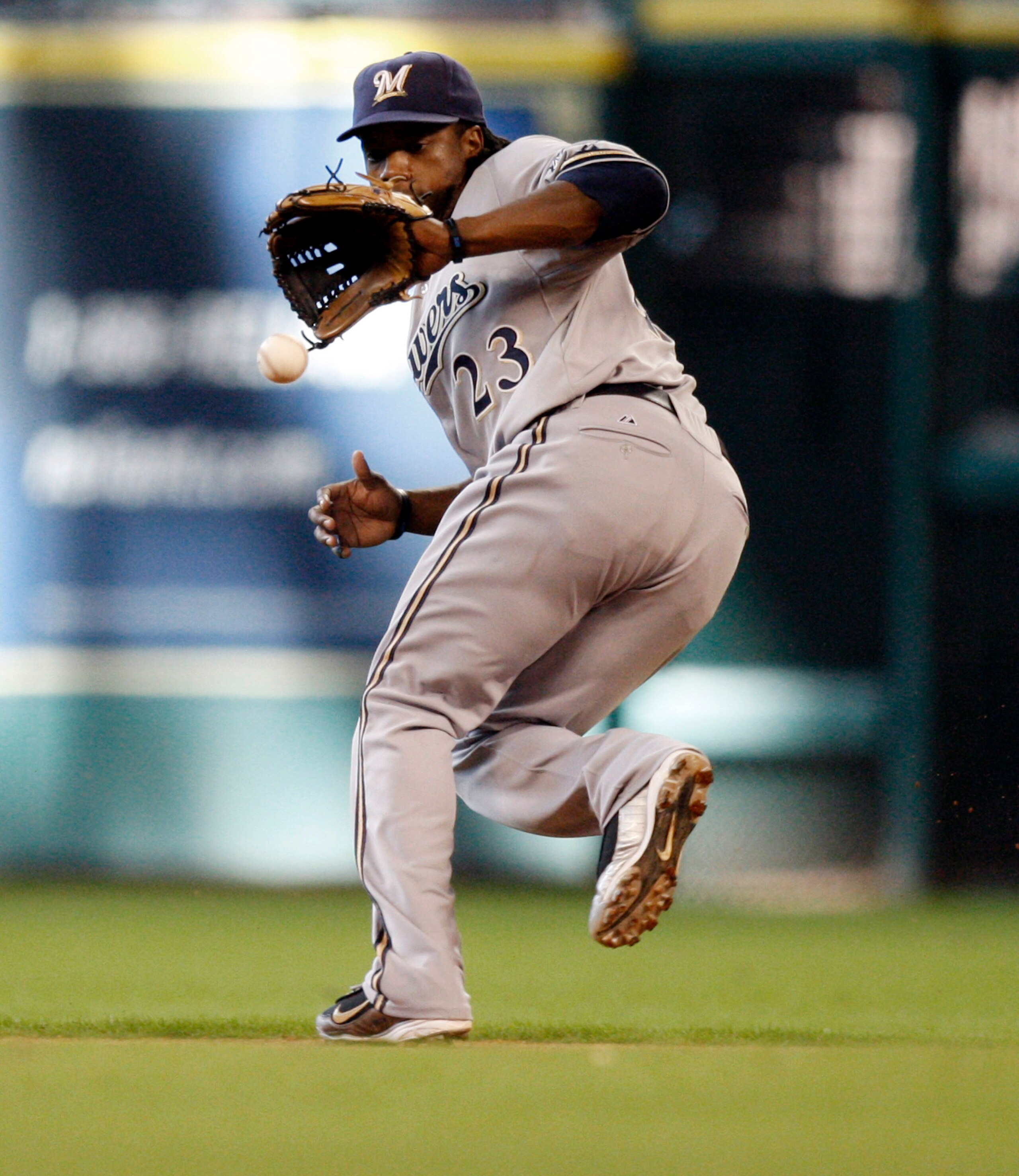 HOUSTON - SEPTEMBER 15: Second baseman Rickie Weeks #23 of the Milwaukee Brewers makes a backhand stab on a ball hit up the middle by the Houston Astros at Minute Maid Park on September 15, 2010 in Houston, Texas. (Photo by Bob Levey/Getty Images) HOUSTON - SEPTEMBER 15: Second baseman Rickie Weeks #23 of the Milwaukee Brewers makes a backhand stab on a ball hit up the middle by the Houston Astros at Minute Maid Park on September 15, 2010 in Houston, Texas. (Photo by Bob Levey/Getty Images)