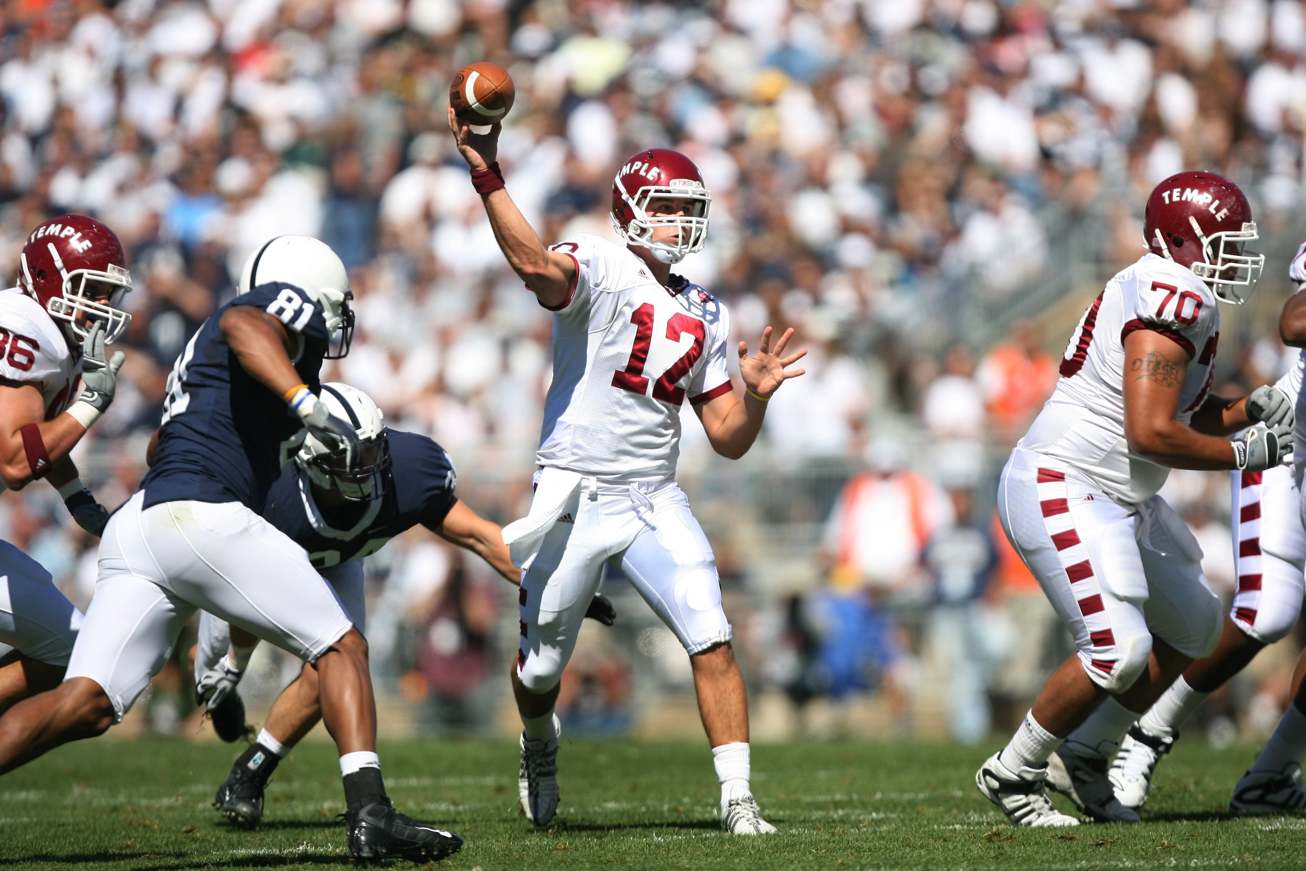 STATE COLLEGE, PA - SEPTEMBER 19: Quarterback Vaughn Charlton #12 of the Temple Owls throws a pass during a game against the Penn State Nittany Lions on September 19, 2009 at Beaver Stadium in State College, Pennsylvania. (Photo by Hunter Martin/Getty Ima STATE COLLEGE, PA - SEPTEMBER 19: Quarterback Vaughn Charlton #12 of the Temple Owls throws a pass during a game against the Penn State Nittany Lions on September 19, 2009 at Beaver Stadium in State College, Pennsylvania. (Photo by Hunter Martin/Getty Ima
