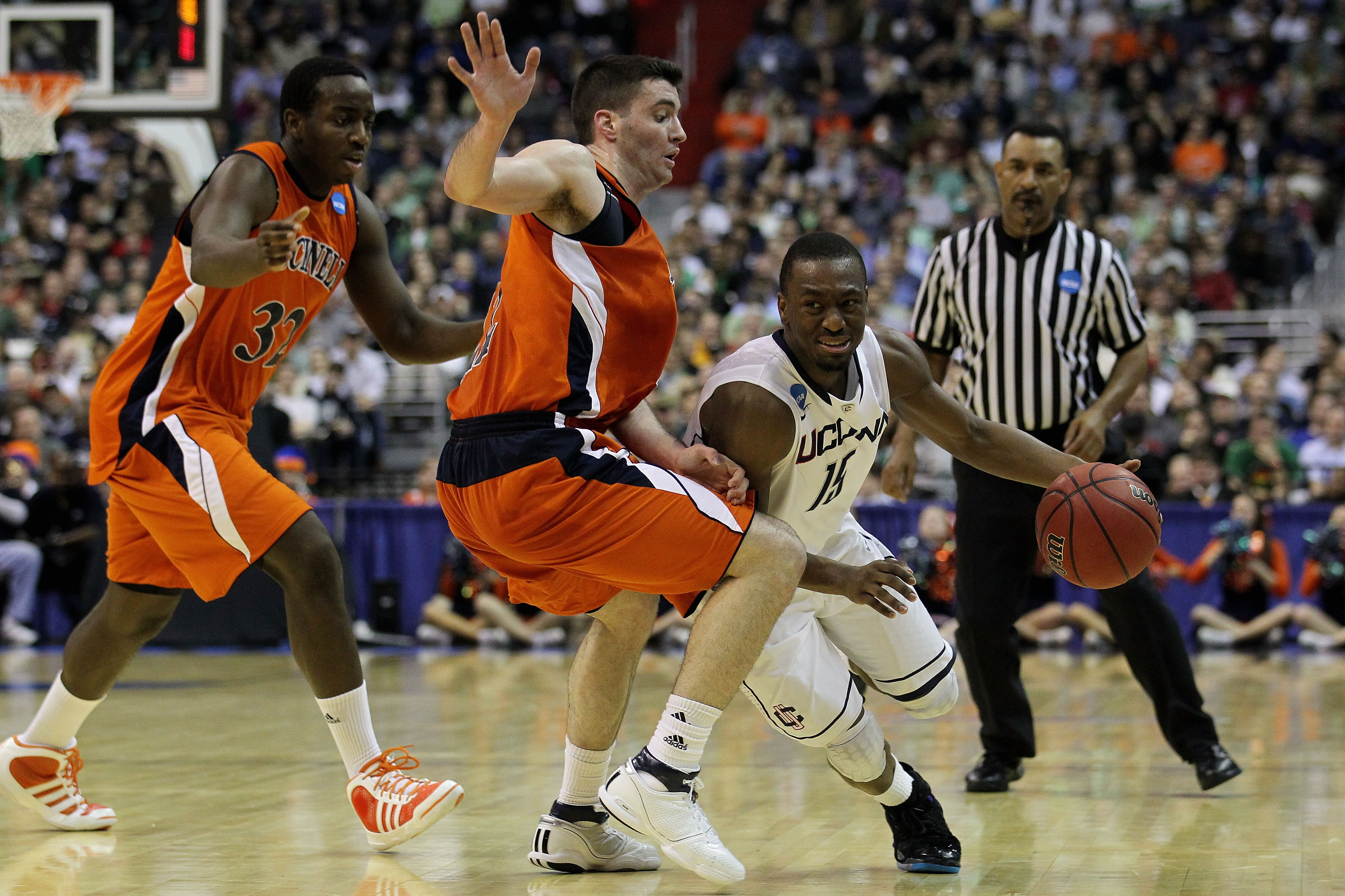 WASHINGTON - MARCH 17:  Kemba Walker #15 of the Connecticut Huskies drives past Bryan Cohen #22 of the Bucknell Bison during the second round of the 2011 NCAA men's basketball tournament at the Verizon Center on March 17, 2011 in Washington, DC.  (Photo b