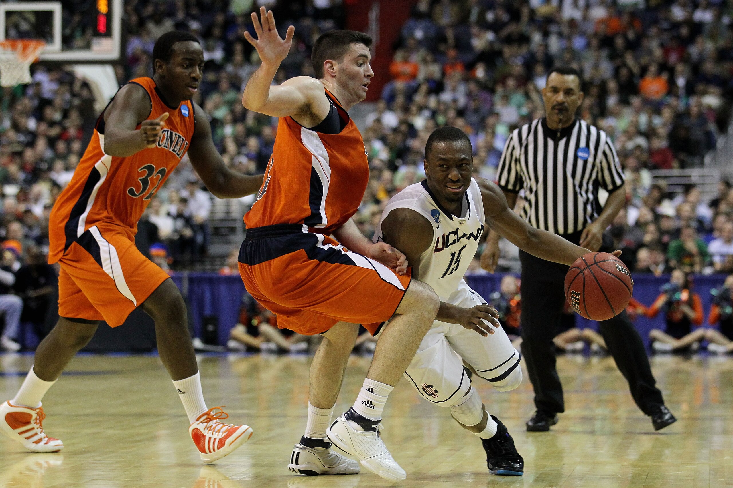 WASHINGTON - MARCH 17:  Kemba Walker #15 of the Connecticut Huskies drives past Bryan Cohen #22 of the Bucknell Bison during the second round of the 2011 NCAA men's basketball tournament at the Verizon Center on March 17, 2011 in Washington, DC.  (Photo b