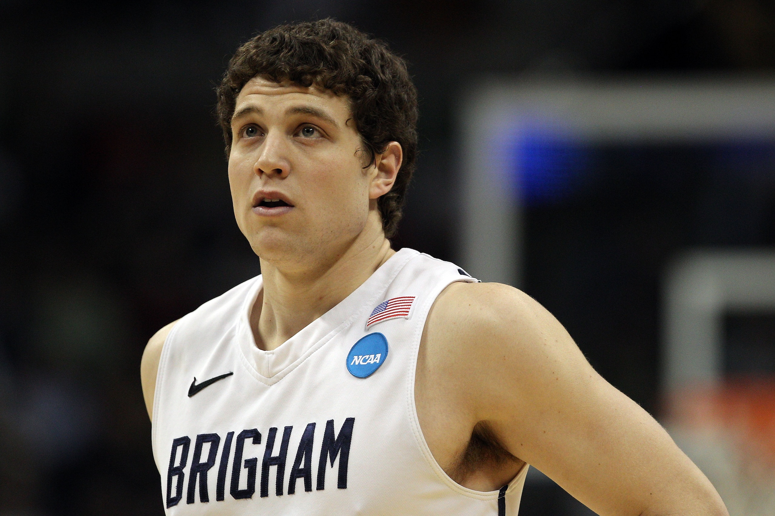 DENVER, CO - MARCH 17:  Jimmer Fredette #32 of the Brigham Young Cougars looks on against the Wofford Terriers during the second round of the 2011 NCAA men's basketball tournament at Pepsi Center on March 17, 2011 in Denver, Colorado.  (Photo by Justin Ed