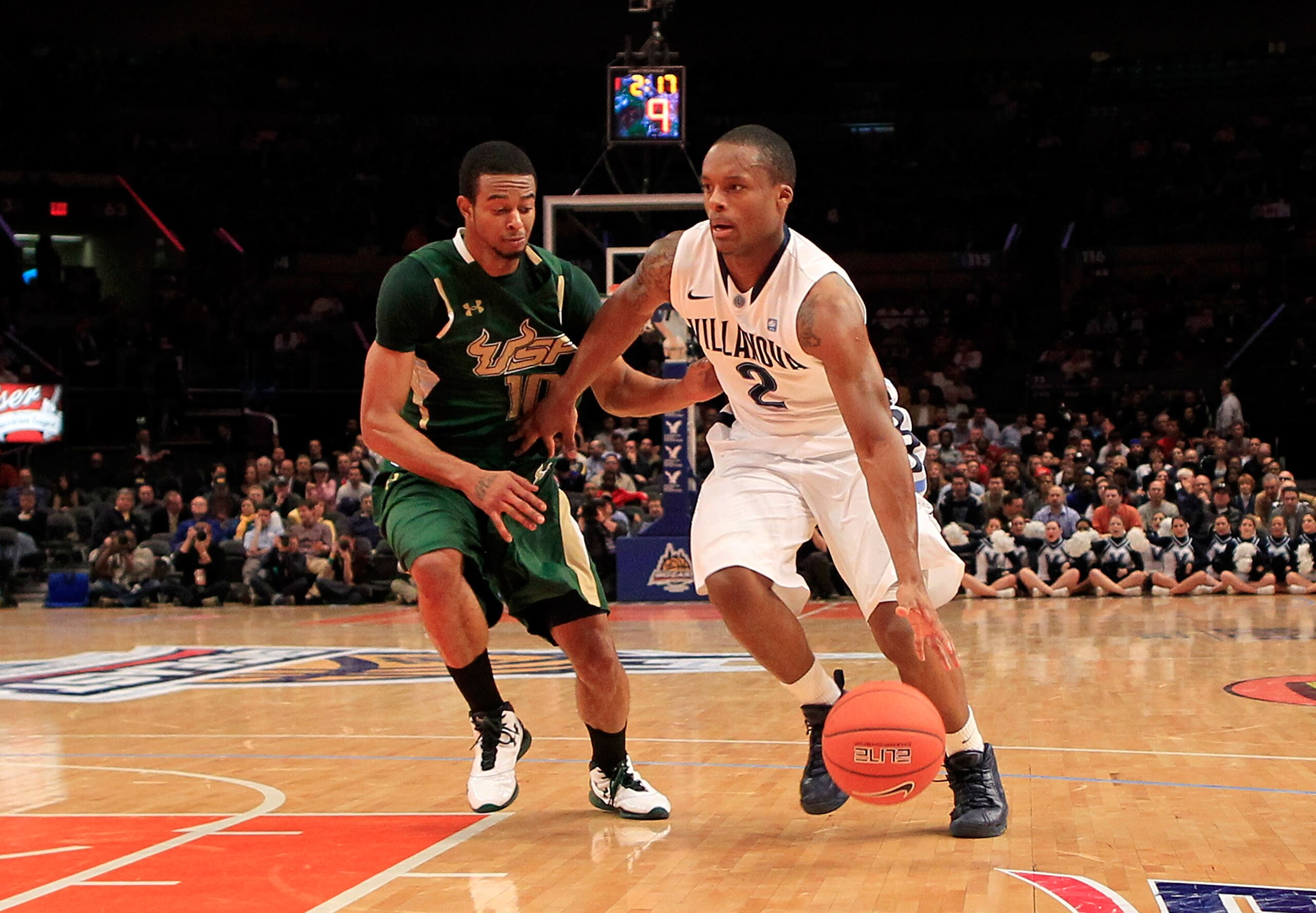 NEW YORK, NY - MARCH 08: Maalik Wayns #2 of the Villanova Wildcats dribbles past Anthony Crater #10 of the South Florida Bulls during the first round of the 2011 Big East Men's Basketball Tournament presented by American Eagle Outfitters at Madison Square