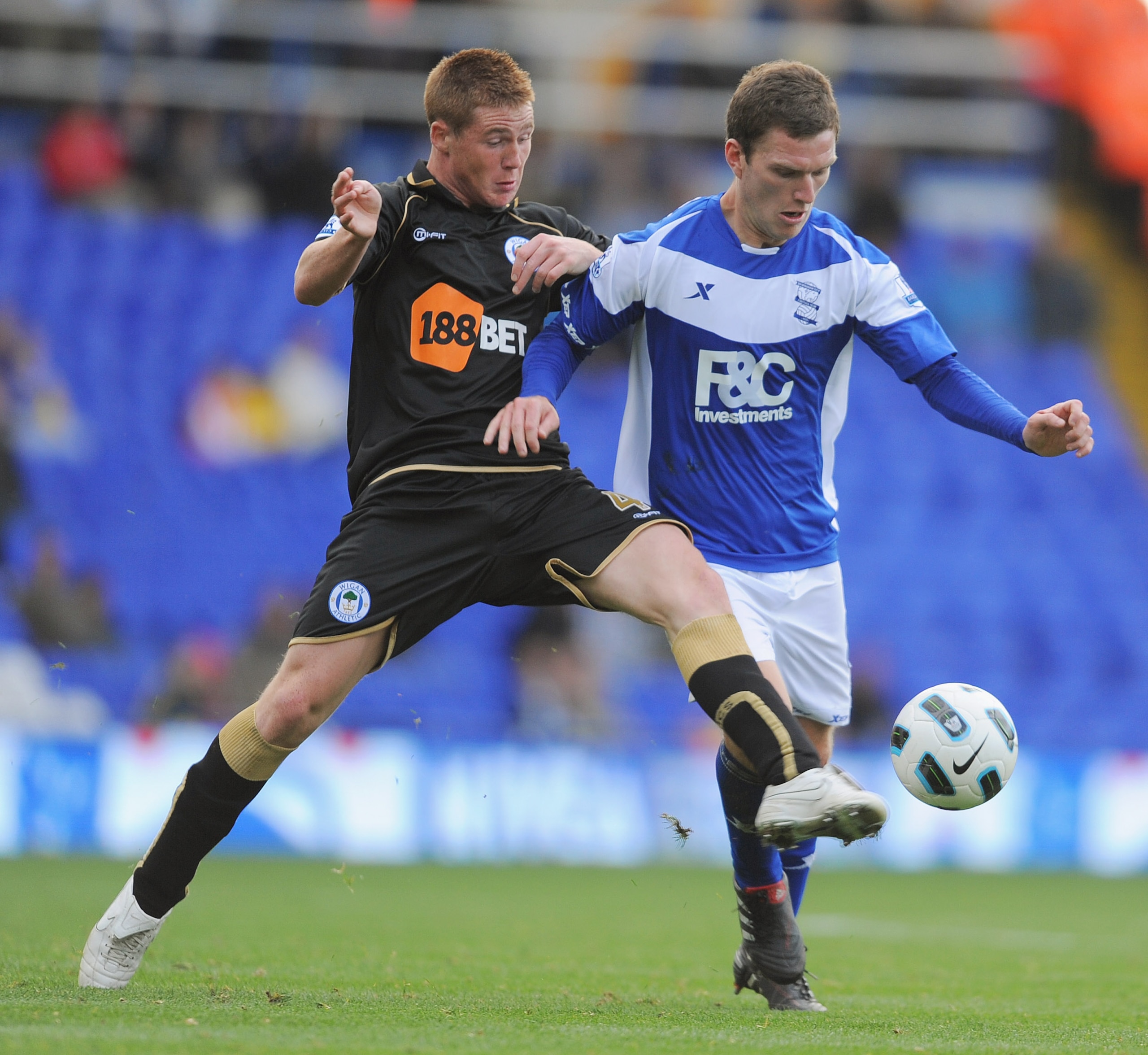 BIRMINGHAM, ENGLAND - SEPTEMBER 25:  Craig Gardner of Birmingham in action with James McCarthyi of Wigan during the Barclays Premier League match between Birmingham City and Wigan Athletic at St Andrews on September 25, 2010 in Birmingham, England.  (Phot