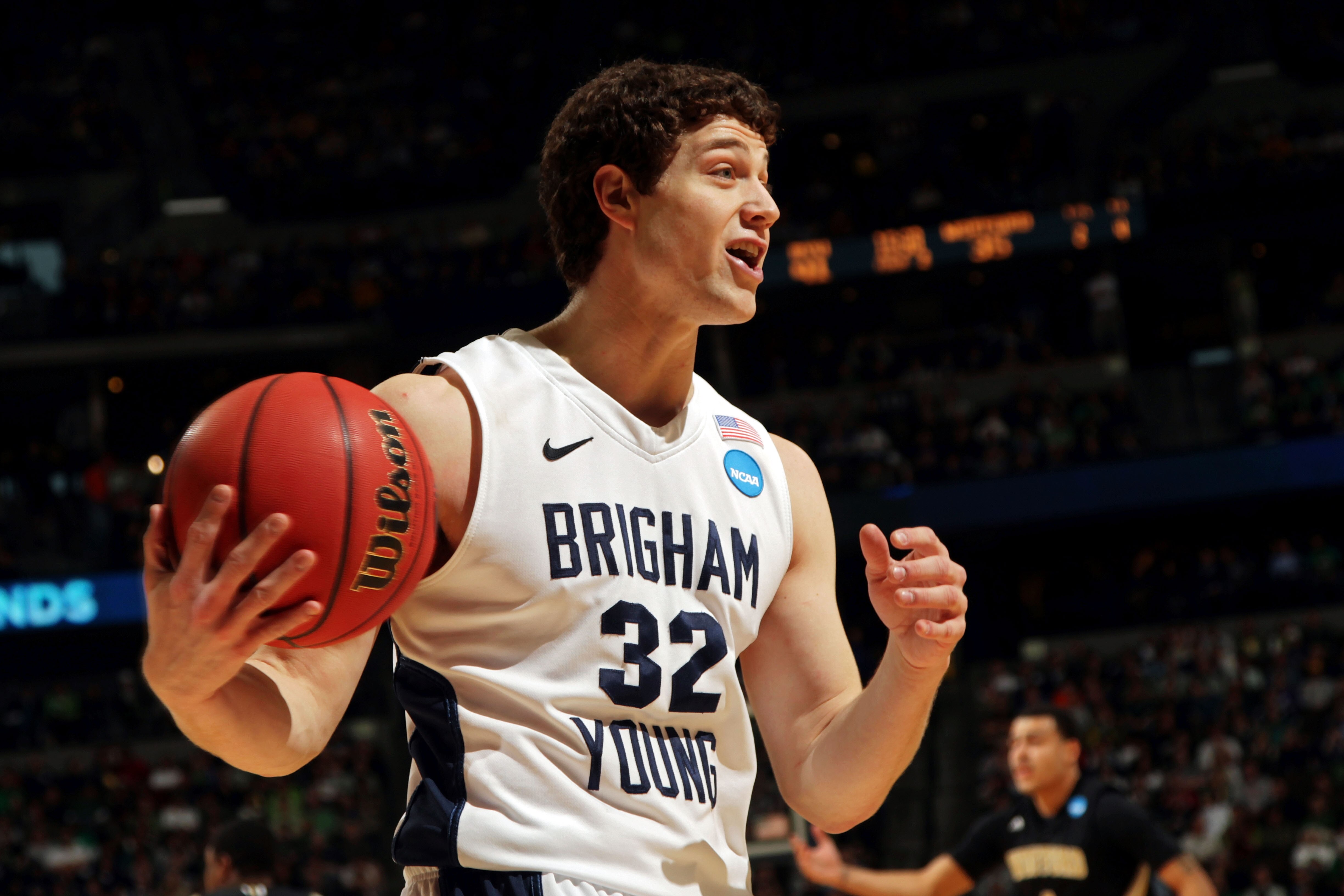 DENVER, CO - MARCH 17:  Jimmer Fredette #32 of the Brigham Young Cougars reacts to a call while playing against the Wofford Terriers during the second round of the 2011 NCAA men's basketball tournament at Pepsi Center on March 17, 2011 in Denver, Colorado
