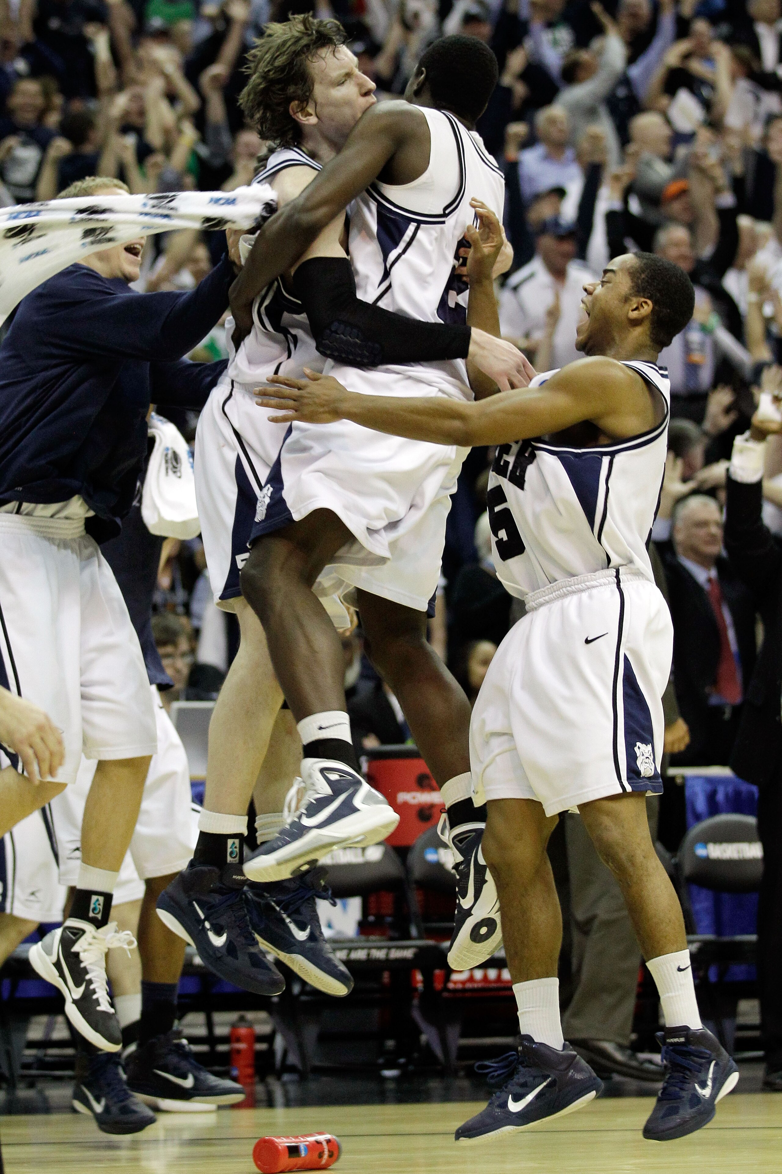 WASHINGTON - MARCH 17:  The Butler Bulldogs celebrate defeating the Old Dominion Monarchs 60-58 during the second round of the 2011 NCAA men's basketball tournament at the Verizon Center on March 17, 2011 in Washington, DC.  (Photo by Rob Carr/Getty Image