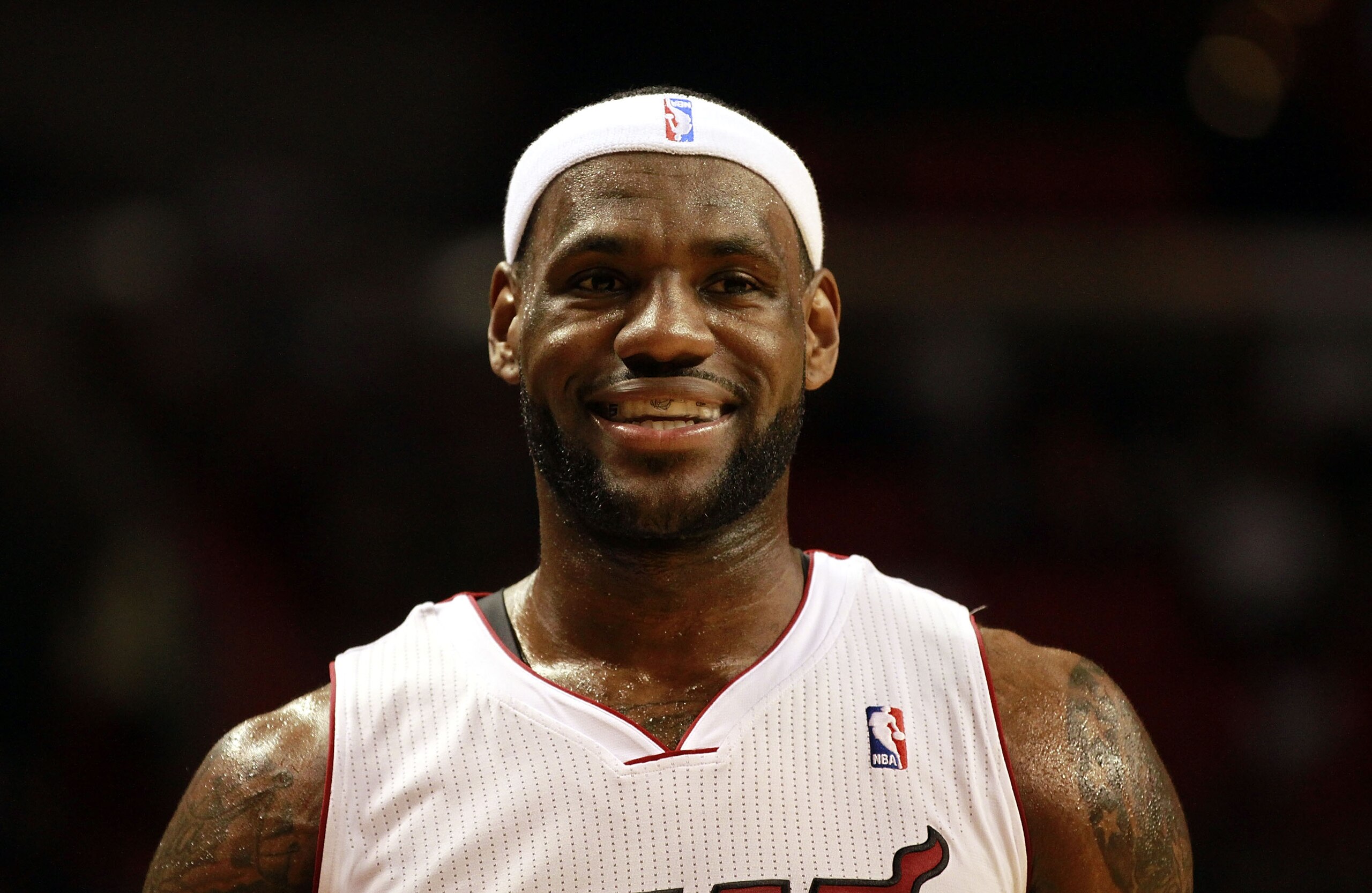 MIAMI - MARCH 12:  Forward LeBron James #6 of the Miami Heat is introduced against the Memphis Grizzlies at American Airlines Arena on March 12, 2011 in Miami, Florida. NOTE TO USER: User expressly acknowledges and agrees that, by downloading and/or using