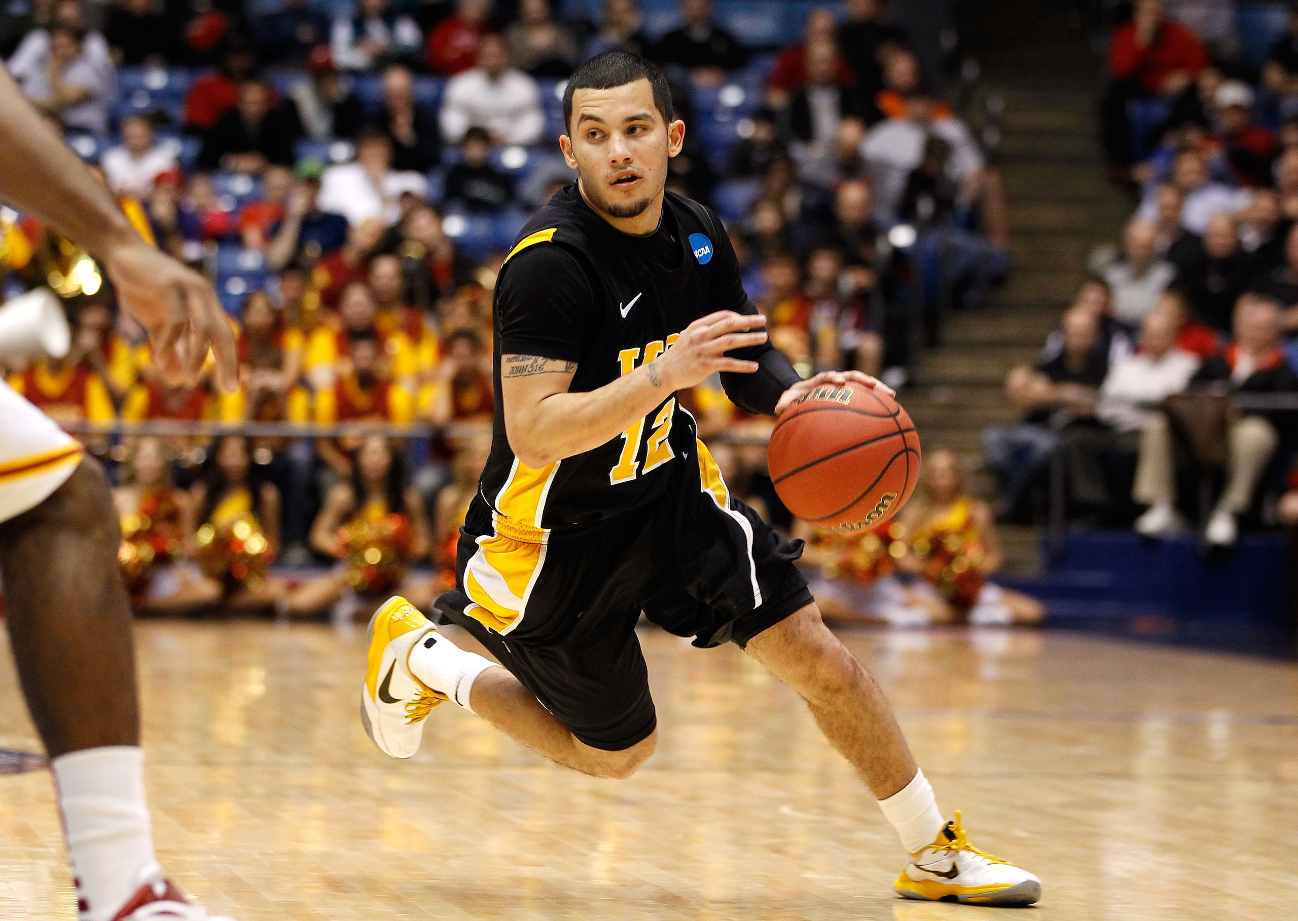DAYTON, OH - MARCH 16: Joey Rodriguez #12 of the Virginia Commonwealth Rams dribbles the ball against the USC Trojans during the first round of the 2011 NCAA men's basketball tournament at UD Arena on March 16, 2011 in Dayton, Ohio.  (Photo by Gregory Sha