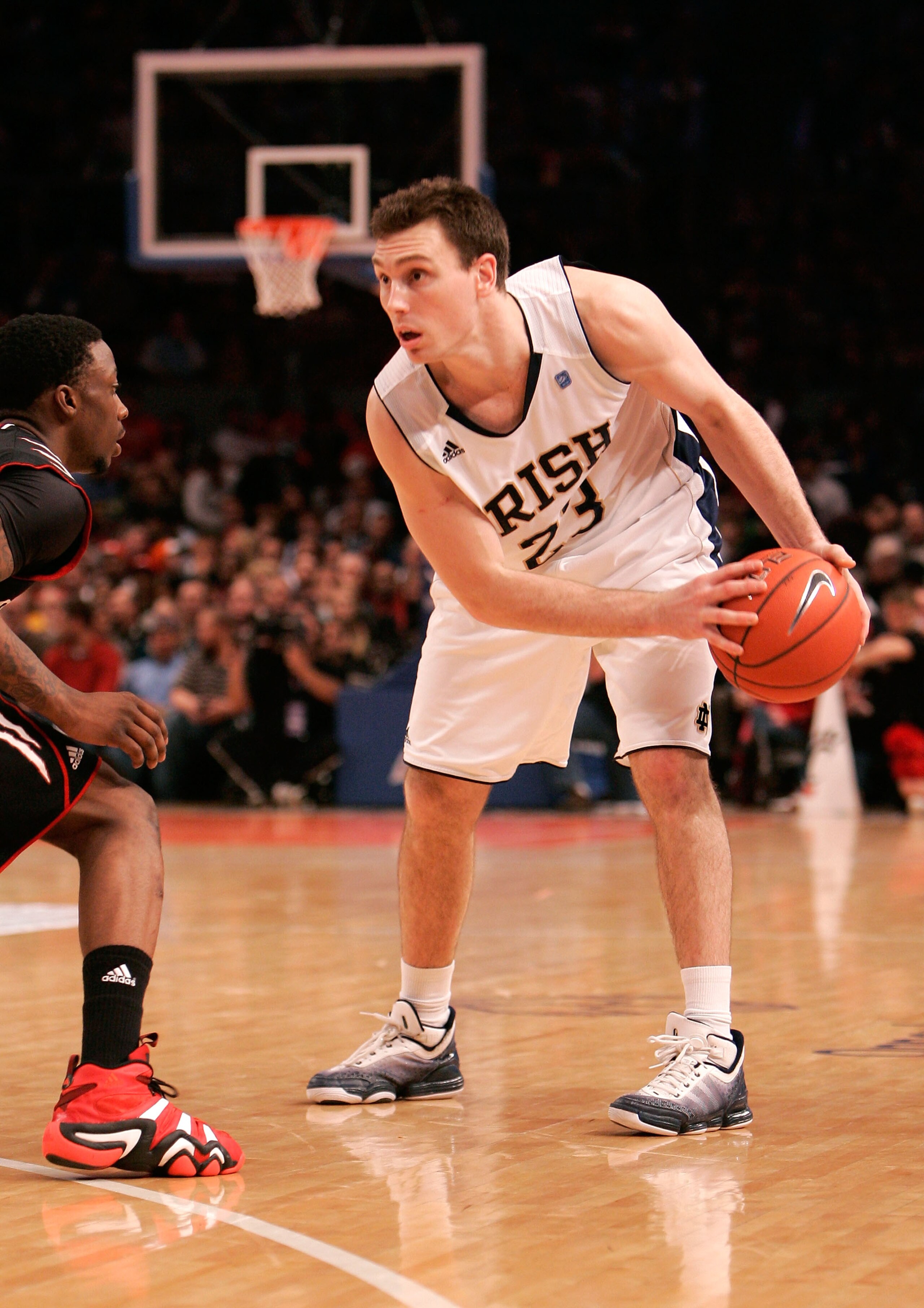 NEW YORK, NY - MARCH 10:  Ben Hansbrough #23 of the Notre Dame Fighting Irish handles the ball against the Cincinnati Bearcats during the quarterfinals of the 2011 Big East Men's Basketball Tournament presented by American Eagle Outfitters  at Madison Squ