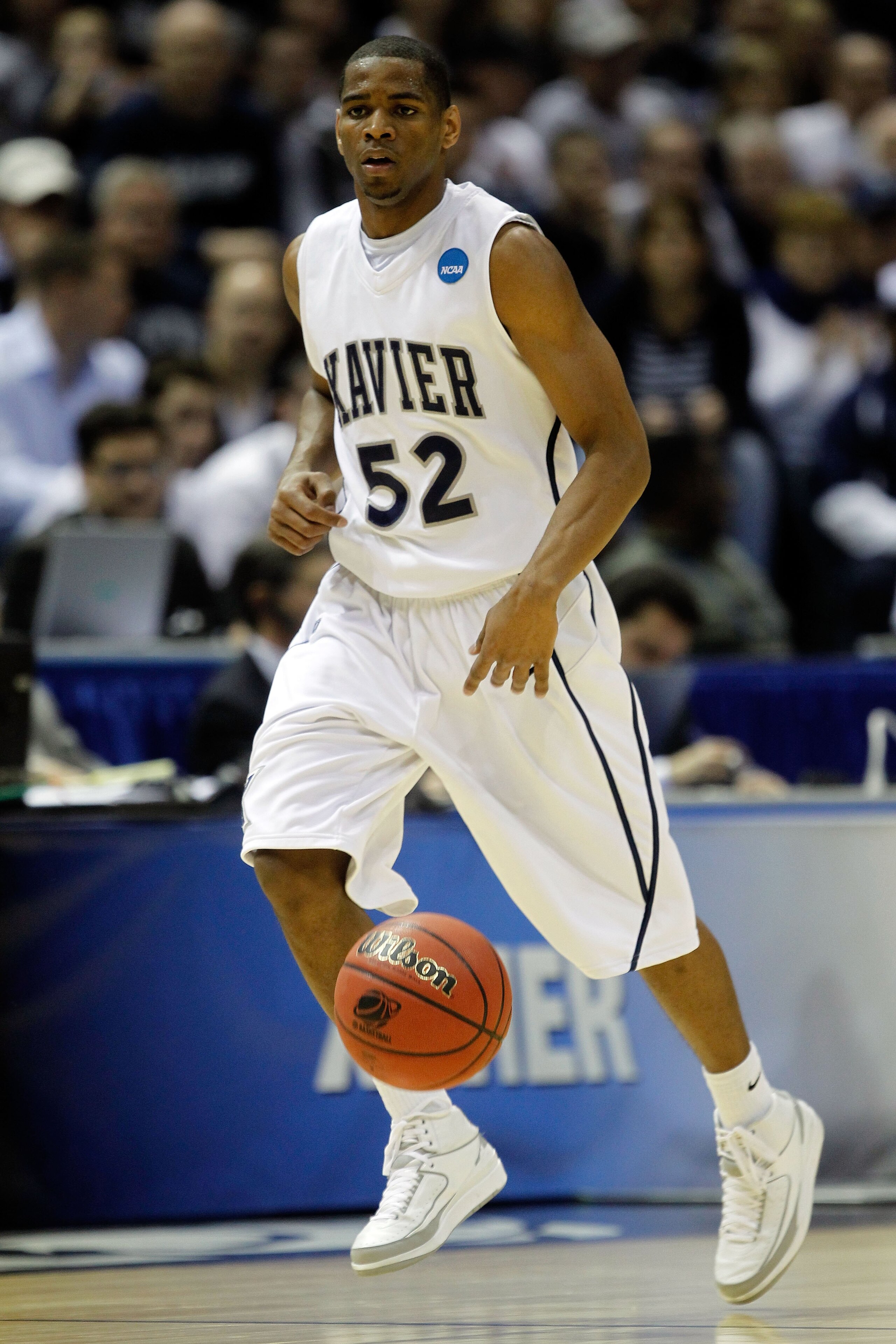 MILWAUKEE - MARCH 19:  Terrell Holloway #52 of the Xavier Musketeers moves the ball against the Minnesota Golden Gophers during the first round of the 2010 NCAA men's basketball tournament at the Bradley Center on March 19, 2010 in Milwaukee, Wisconsin.