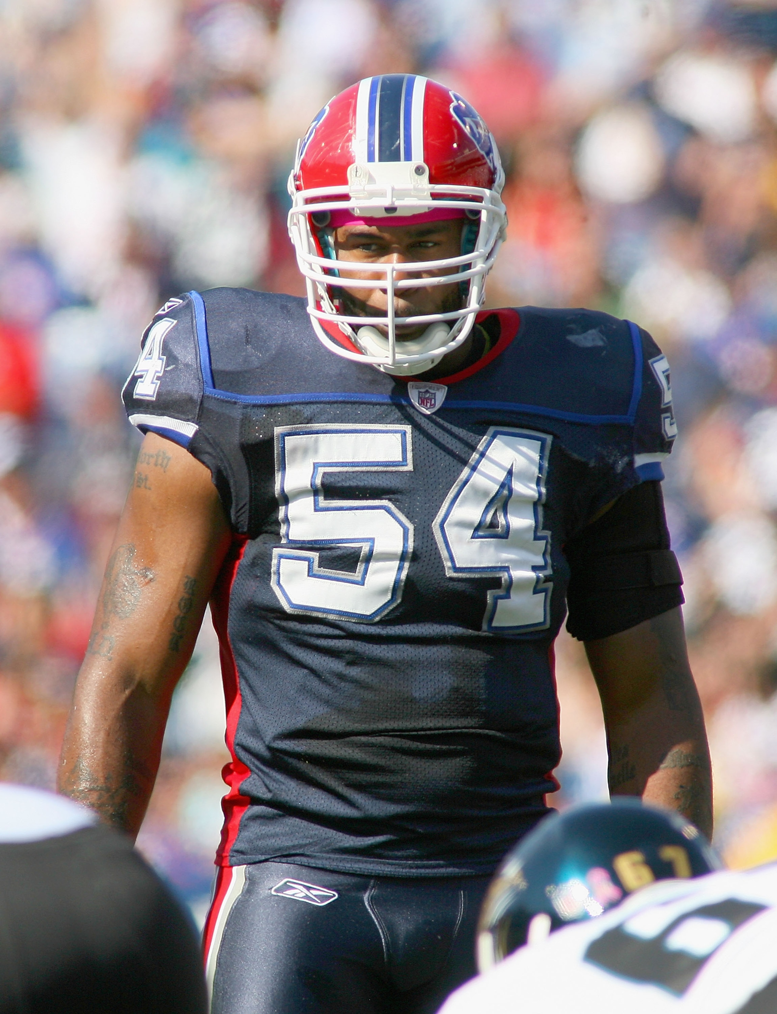 ORCHARD PARK, NY - OCTOBER 10: Andra Davis #54 of the Buffalo Bills lines up against the Jacksonville Jaguars at Ralph Wilson Stadium on October 10, 2010 in Orchard Park, New York. Jacksonville won 36-26. (Photo by Rick Stewart/Getty Images)