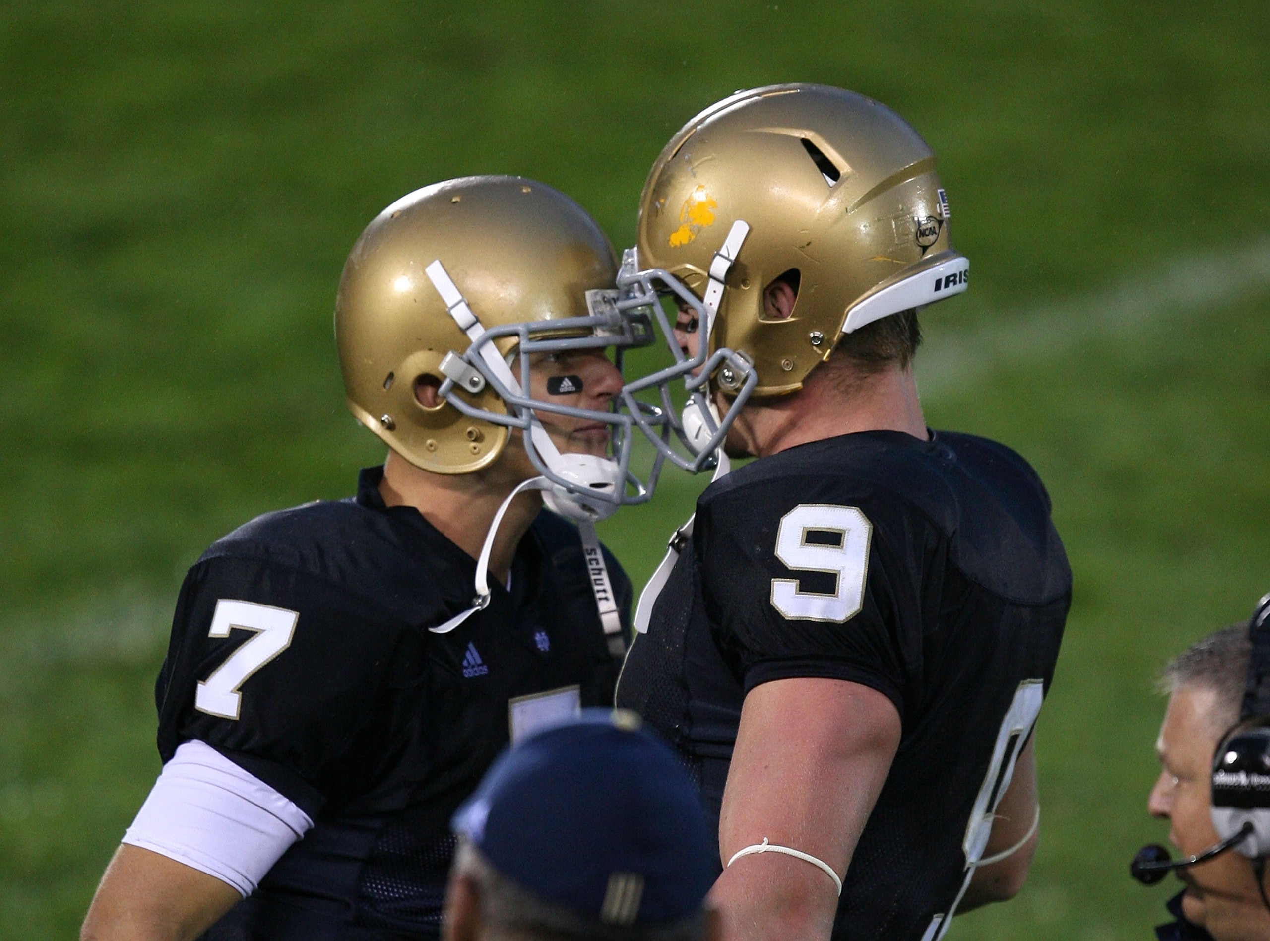 SOUTH BEND, IN - OCTOBER 03: Jimmy Clausen #7 and Kyle Rudolph #9 of the Notre Dame Fighting Irish celebrate a 4th quarter touchdown on the sidelines against the Washington Huskies on October 3, 2009 at Notre Dame Stadium in South Bend, Indiana. Notre Dam