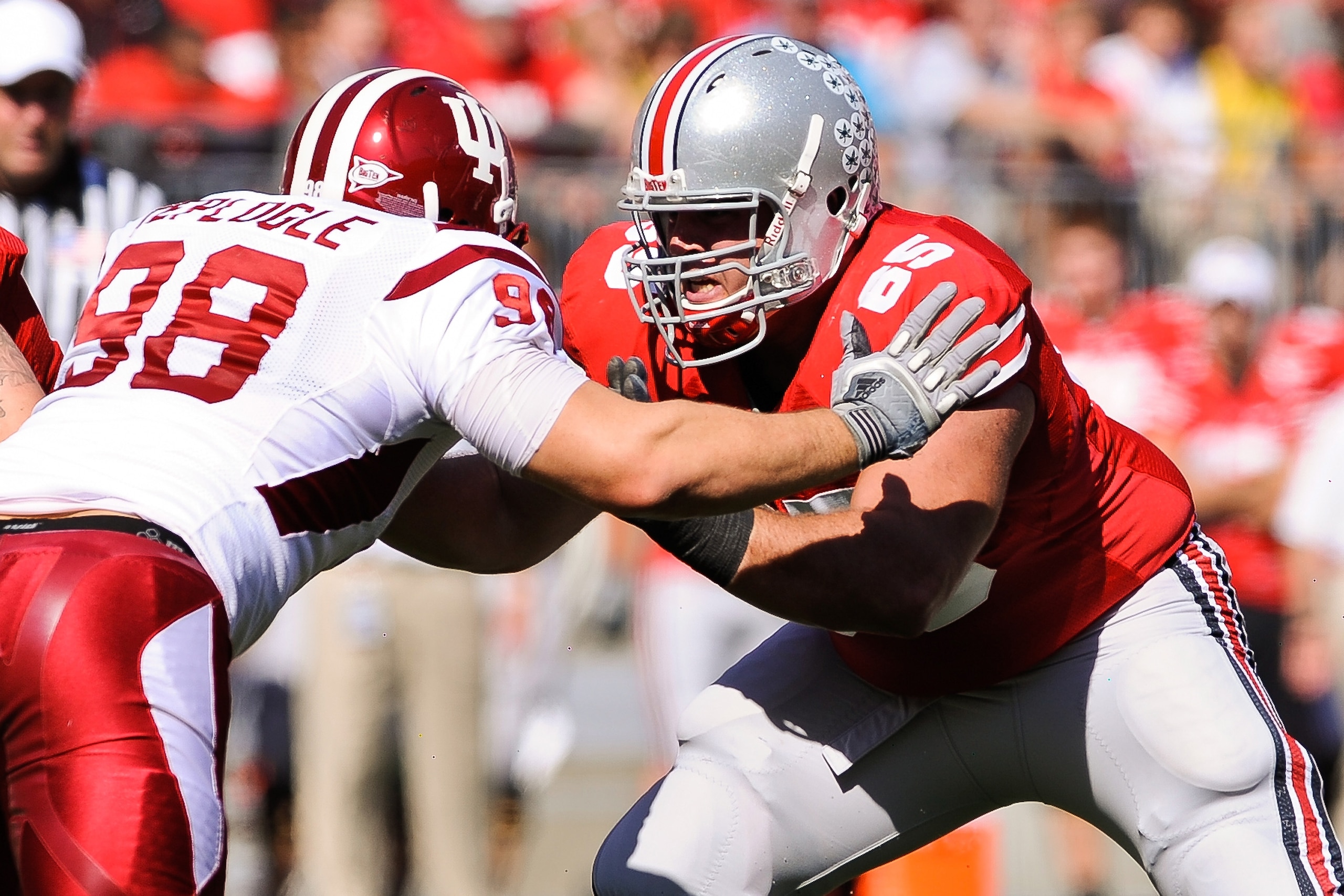 COLUMBUS, OH - OCTOBER 9:  Justin Boren #65 of the Ohio State Buckeyes blocks against the Indiana Hoosiers at Ohio Stadium on October 9, 2010 in Columbus, Ohio.  (Photo by Jamie Sabau/Getty Images)