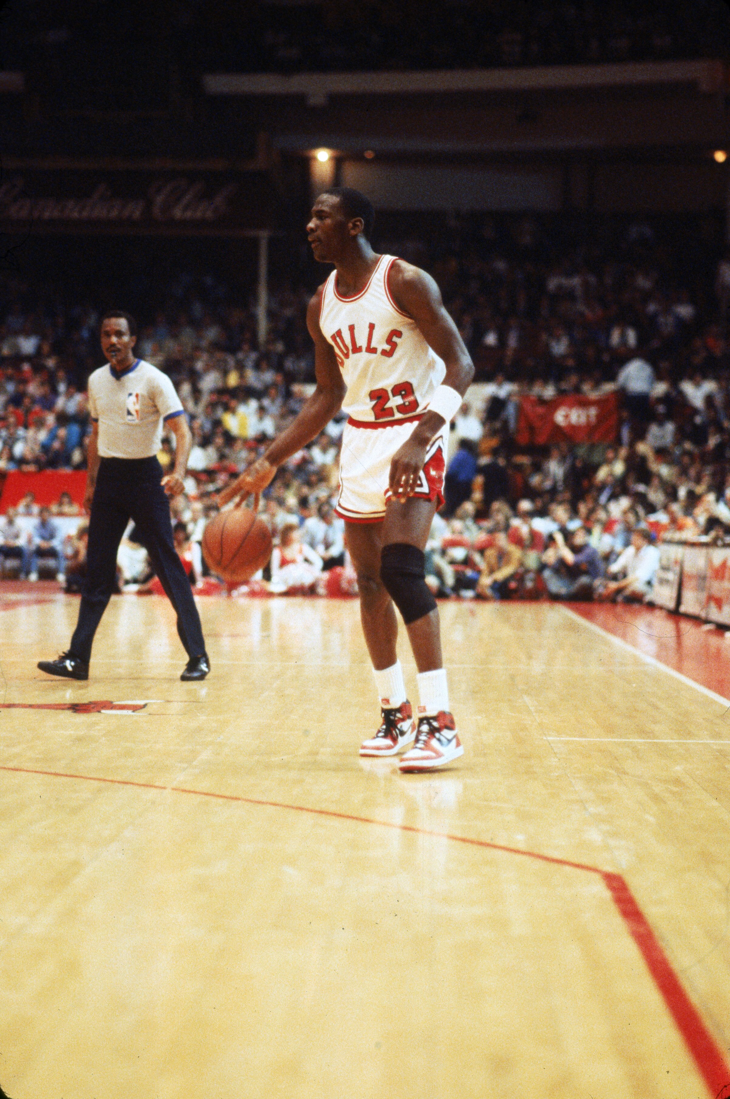 CHICAGO - APRIL 1985:  Michael Jordan #23 of the Chicago Bulls moves the ball at the parameter during an Eastern Conference First Round Playoff game April 1985 game at the Chicago Stadium in Chicago, Illinois. The Bucks won the series 3-1. (Photo by Jonat