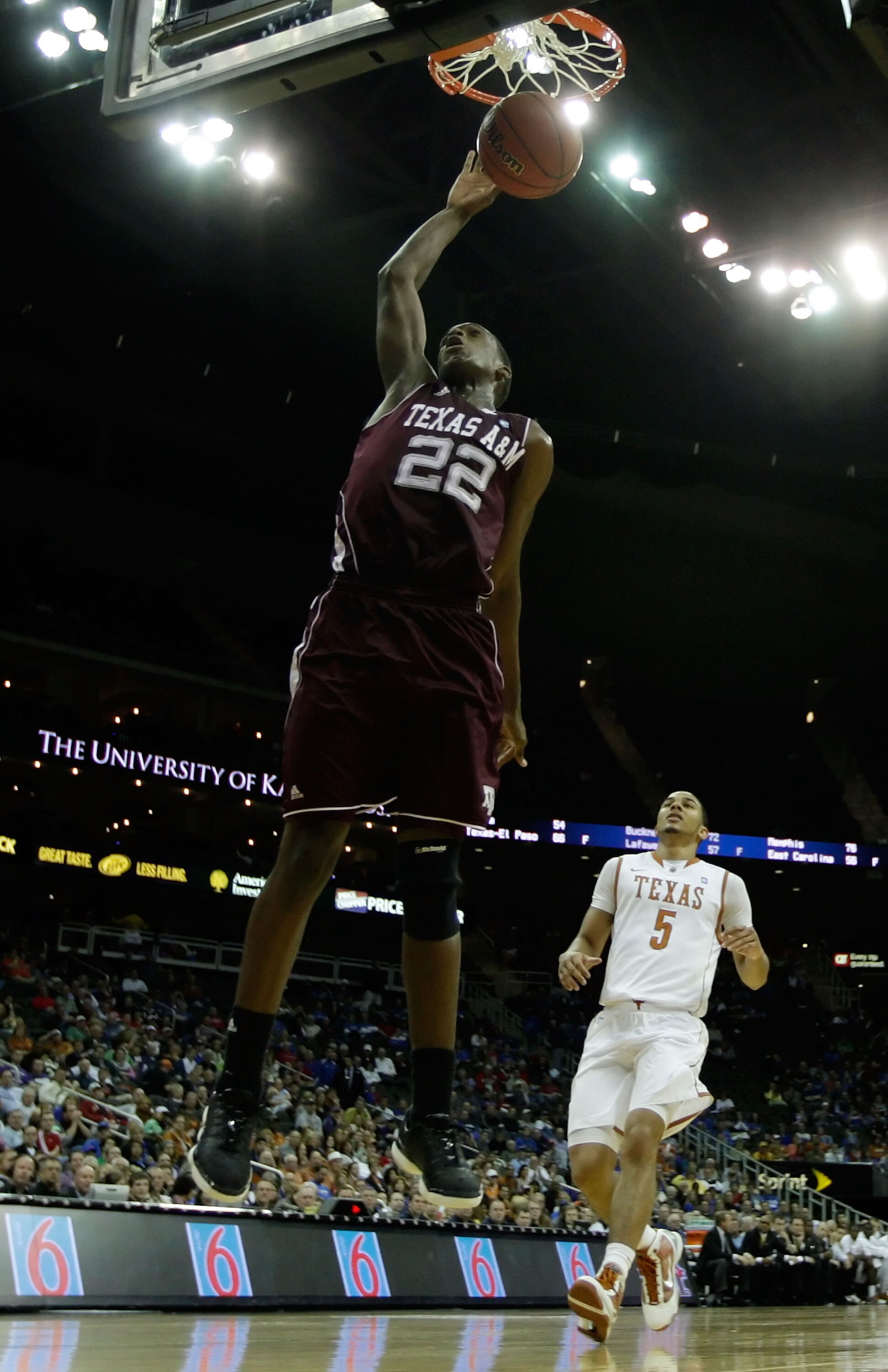 KANSAS CITY, MO - MARCH 11:  Khris Middleton #22 of the Texas A&M Aggies dunks the ball against the Texas Longhorns during their semifinal game in the 2011 Phillips 66 Big 12 Men's Basketball Tournament at Sprint Center on March 11, 2011 in Kansas City, M