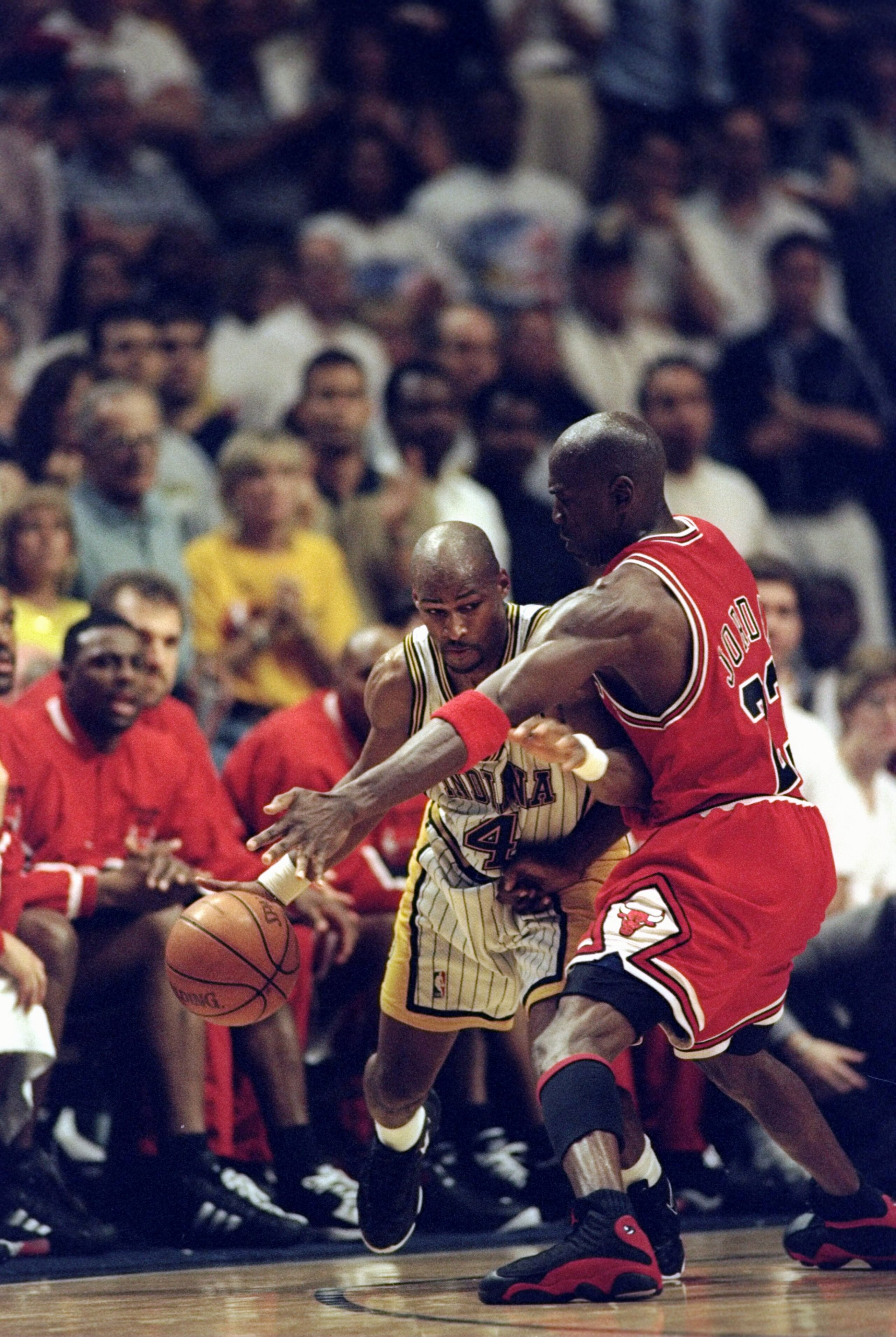 29 May 1998: Travis Best #4 of the Indiana Pacers is guarded by Michael Jordan #23 of the Chicago Bulls during an Eastern Conference Final game at the Market Square Arena in Indianapolis, Indiana. The Pacers defeated the Bulls 92-89.