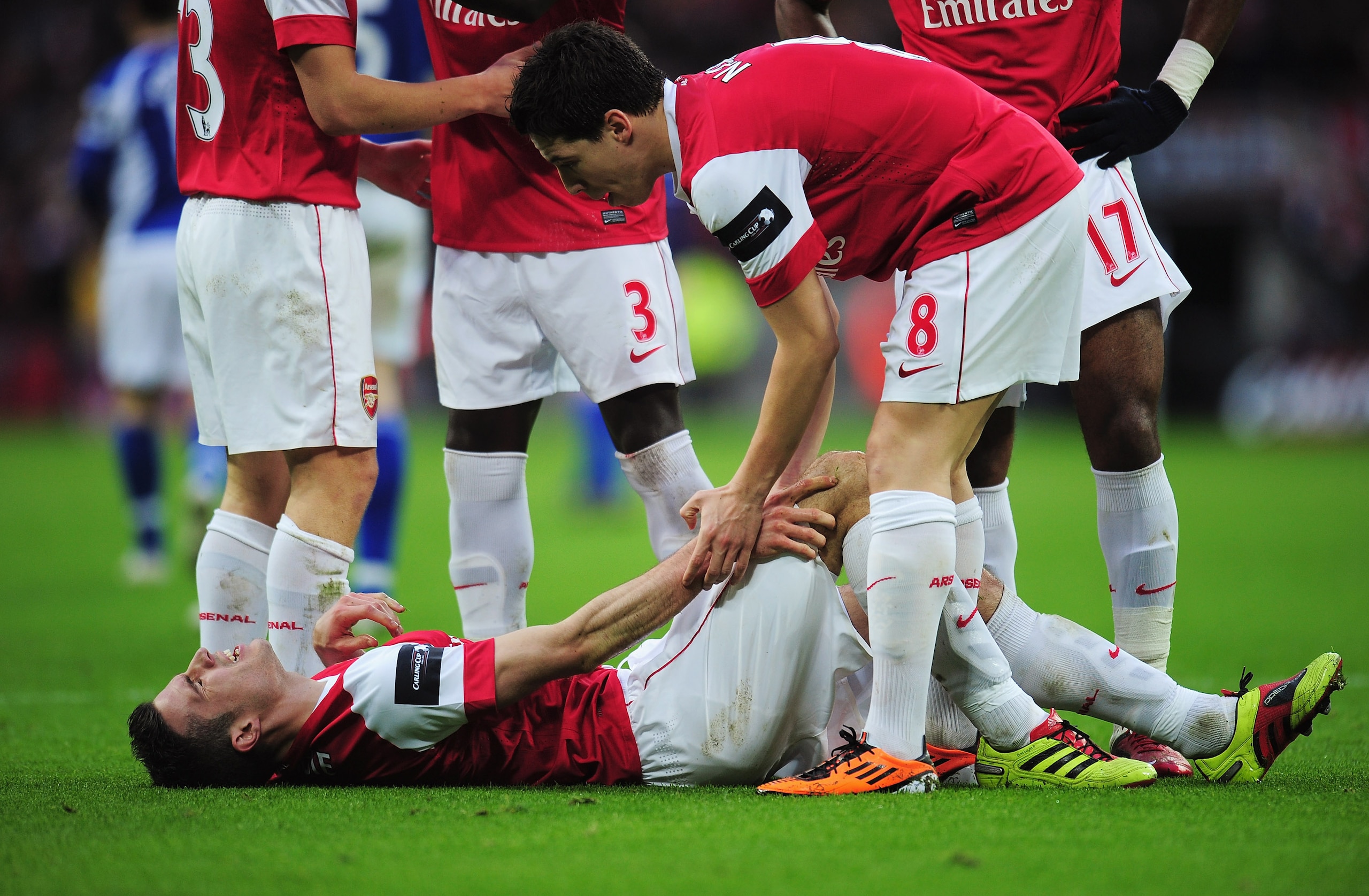 LONDON, ENGLAND - FEBRUARY 27: Robin van Persie of Arsenal lies on the ground as he is spoken to by Samir Nasri during the Carling Cup Final between Arsenal and Birmingham City at Wembley Stadium on February 27, 2011 in London, England. (Photo by Shaun B LONDON, ENGLAND - FEBRUARY 27: Robin van Persie of Arsenal lies on the ground as he is spoken to by Samir Nasri during the Carling Cup Final between Arsenal and Birmingham City at Wembley Stadium on February 27, 2011 in London, England. (Photo by Shaun B