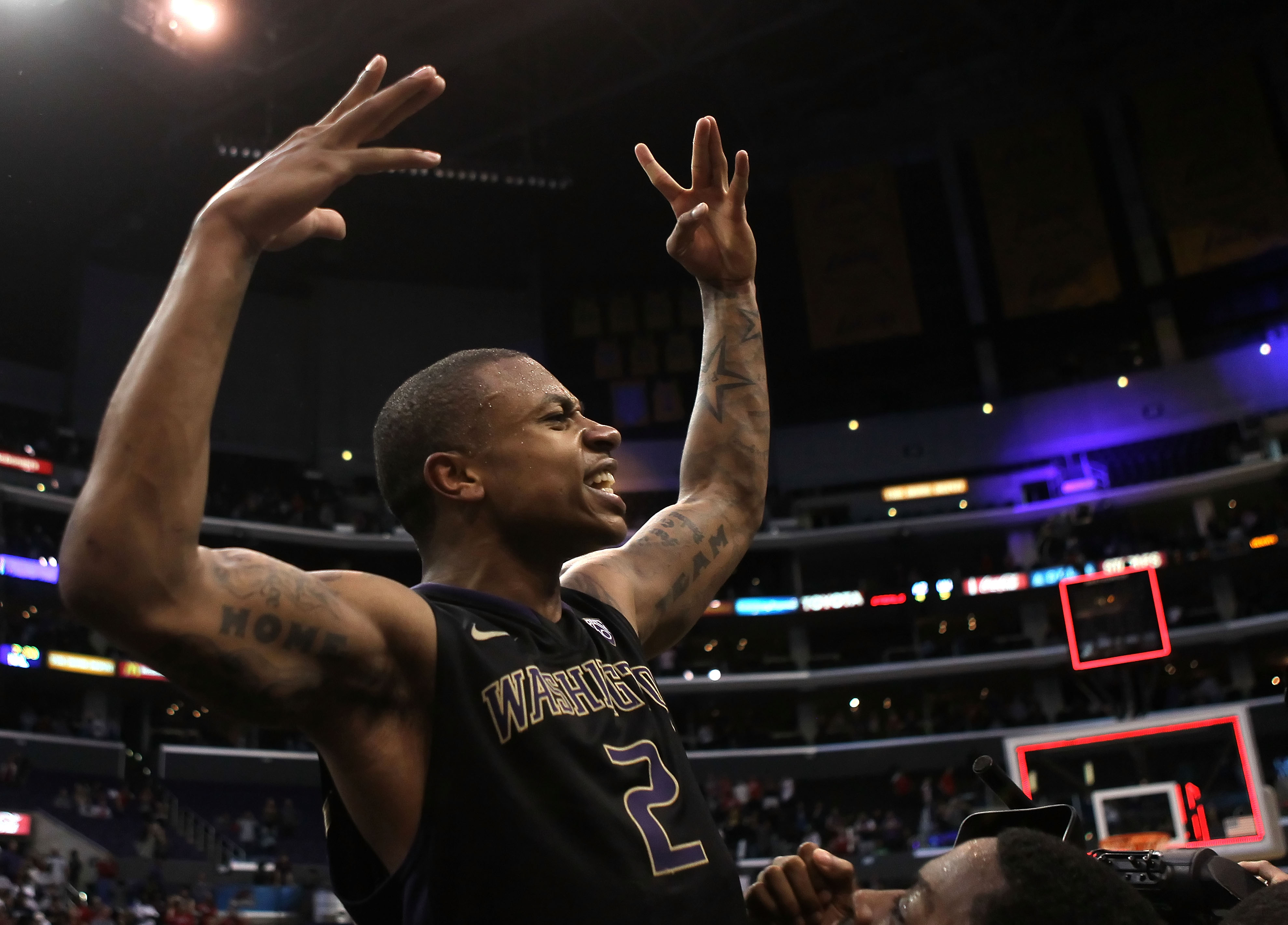 LOS ANGELES, CA - MARCH 12: Isaiah Thomas #2 of the Washington Huskies reacts after making a last-second shot in overtime to defeat the Arizona Wildcats 77-75 in the championship game of the 2011 Pacific Life Pac-10 Men's Basketball Tournament at Staples