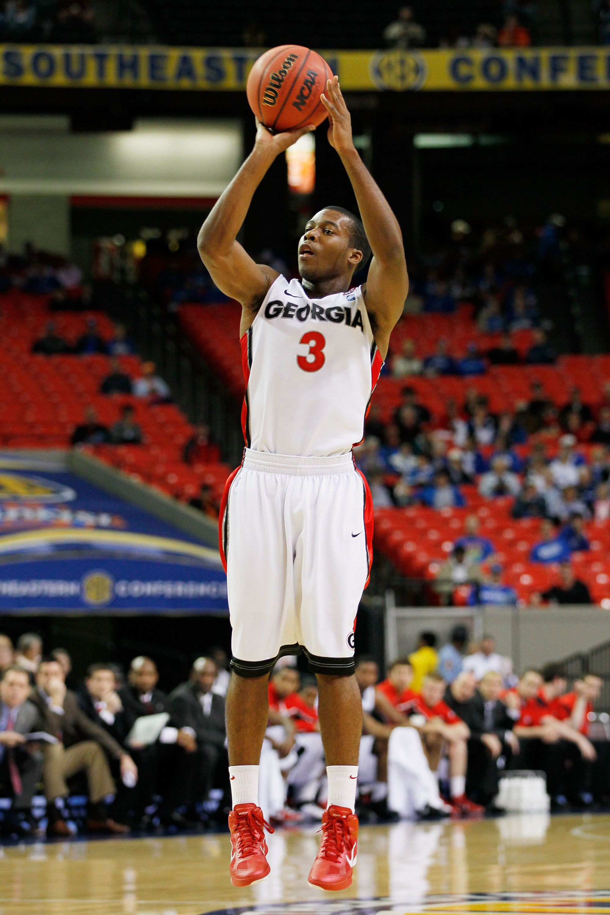 ATLANTA, GA - MARCH 10: Dustin Ware #3 of the Georgia Bulldogs shoots against the Auburn Tigers during the the first round of the SEC Men's Basketball Tournament at the Georgia Dome on March 10, 2011 in Atlanta, Georgia. (Photo by Kevin C. Cox/Getty Ima