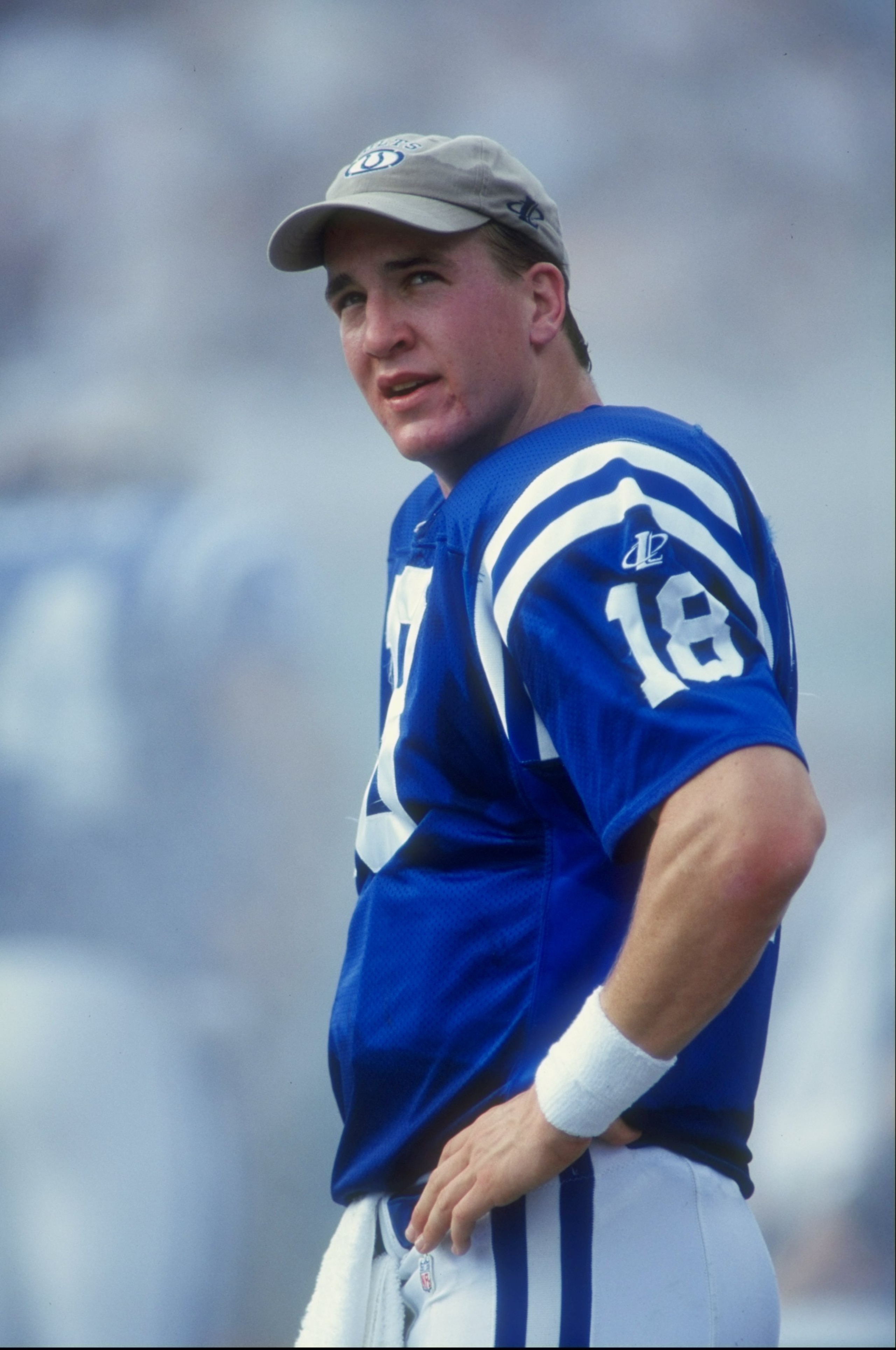18 Nov 1998:  Peyton Manning #18 of the Indianapolis Colts stands as he waits during the game against the Miami Dolphins at Pro Player Stadium in Miami, Florida. The Dolphins defeated the Colts 27-14. Mandatory Credit: Scott Halleran  /Allsport