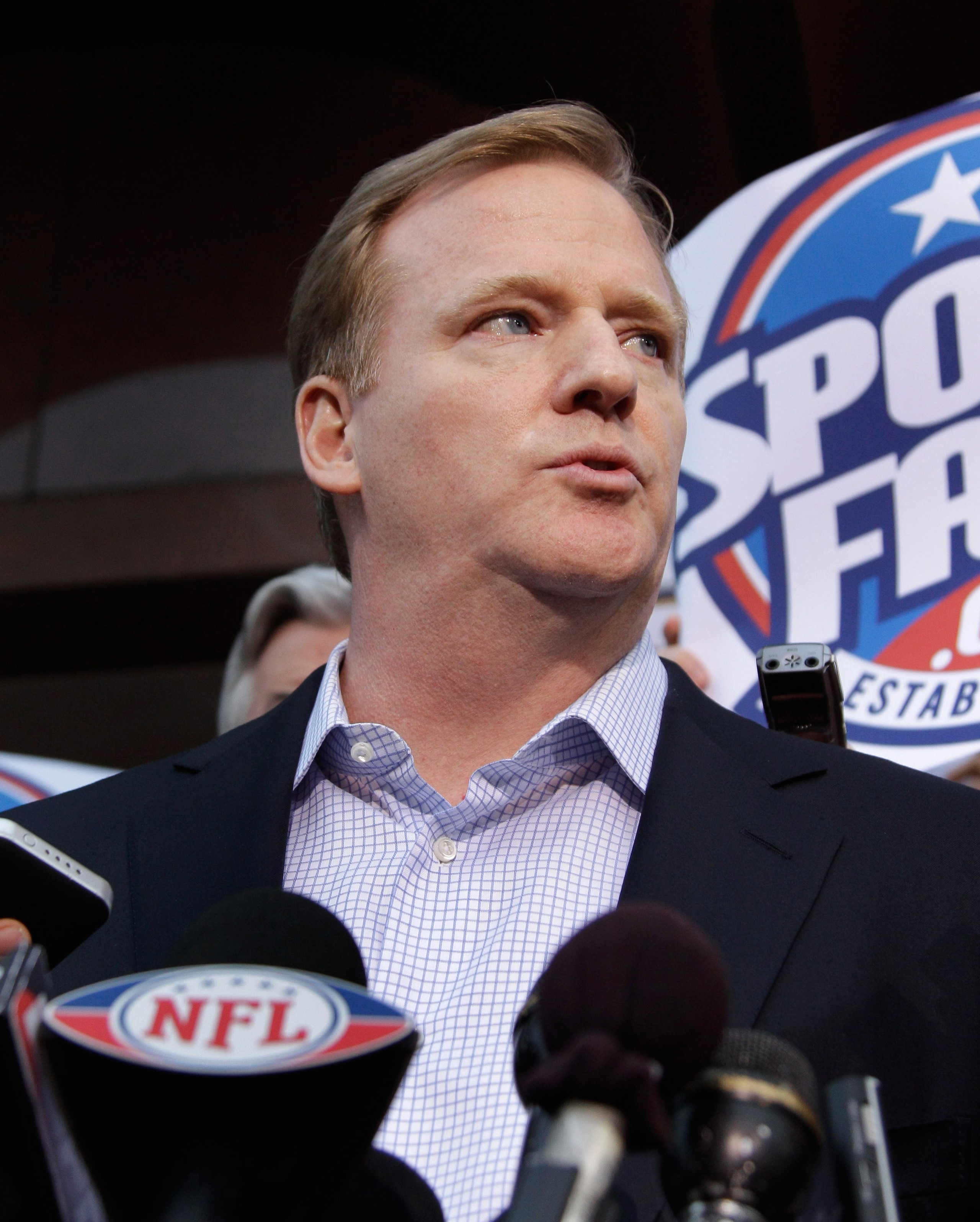 WASHINGTON, DC - MARCH 11:  NFL Commissioner Roger Goodell talks with the media outside the Federal Mediation and Conciliation Service building March 11, 2011 in Washington, DC. The NFLPA has filed for decertification and will no longer be the exclusive c