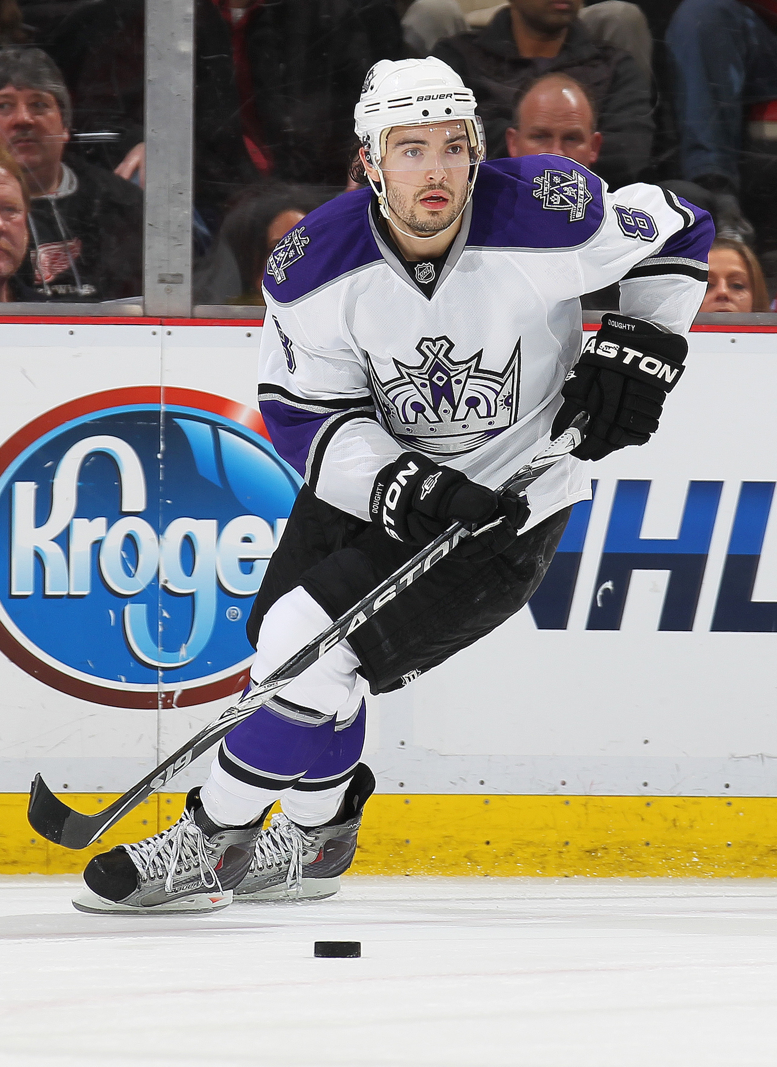 DETROIT, MI - MARCH 9:  Drew Doughty #8 of the Los Angeles Kings skates with the puck in a game against the Detroit Red Wings on March 9, 2011 at the Joe Louis Arena in Detroit, Michigan. The Kings defeated the Wings 2-1. (Photo by Claus Andersen/Getty Im