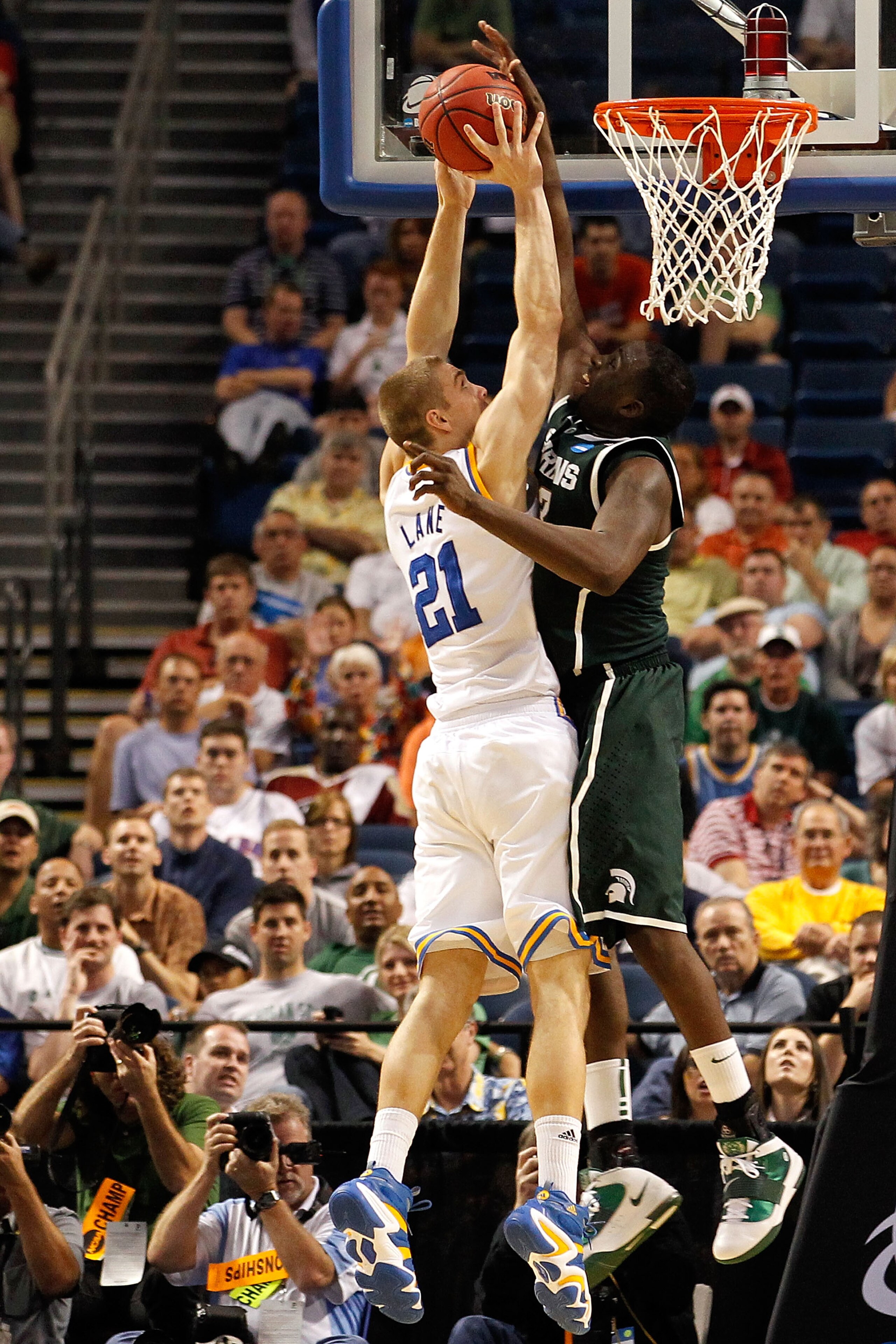 TAMPA, FL - MARCH 17:  Draymond Green #23 of the Michigan State Spartans blocks a shot attempt by Brendan Lane #21 of the UCLA Bruins in the second half during the second round of the 2011 NCAA men's basketball tournament at St. Pete Times Forum on March