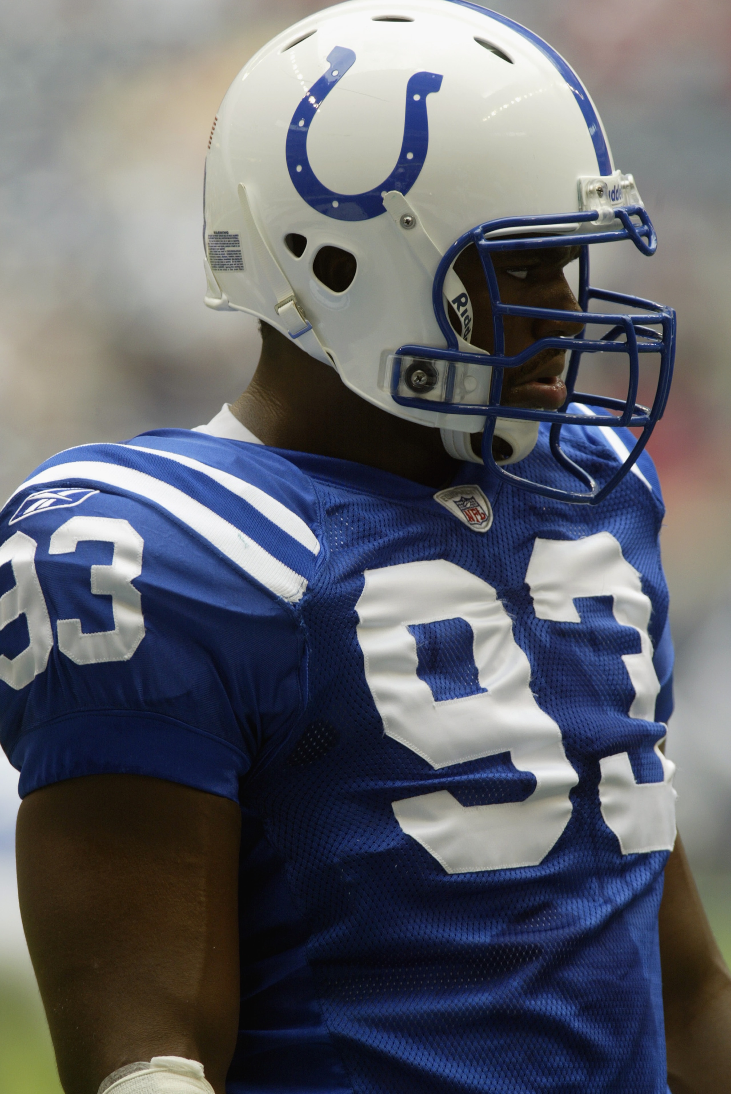 HOUSTON - SEPTEMBER 22:  Defensive end Dwight Freeney #93 of the Indianapolis Colts looks on during warm ups prior to the start of the NFL game against the Houston Texans on September 22, 2002 at Reliant Stadium in Houston, TX.   The Colts defeated the Te