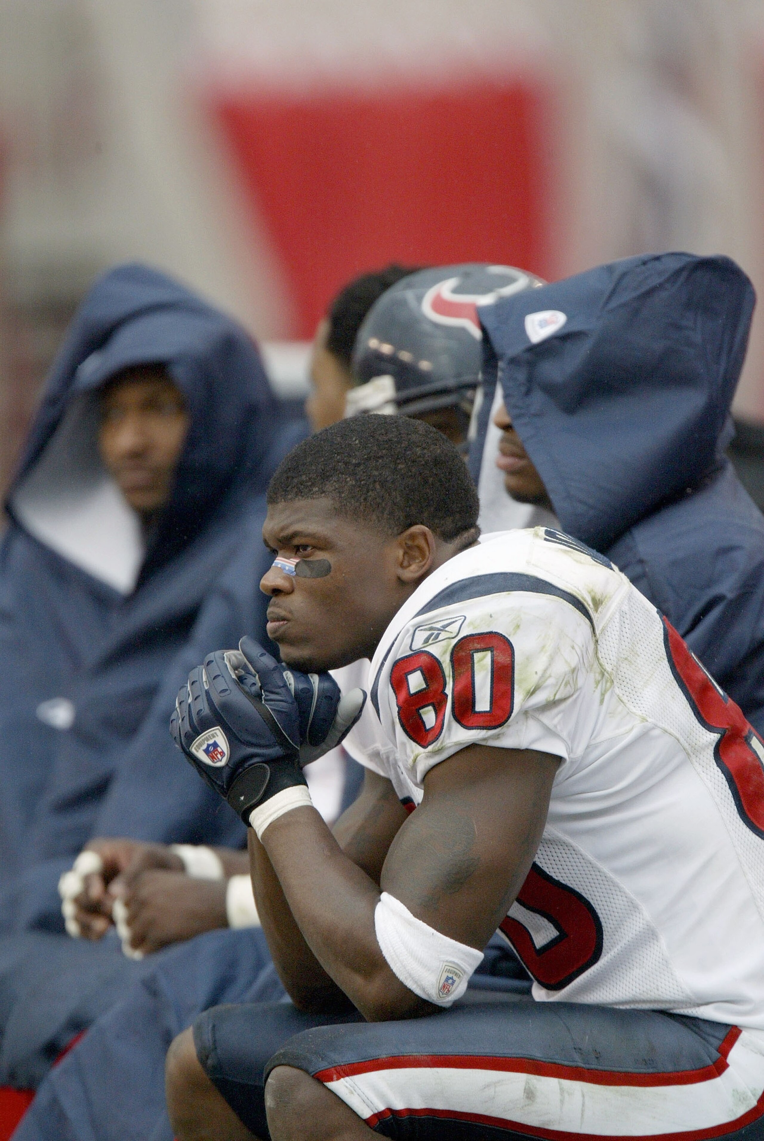 TAMPA, FL - DECEMBER 14:  Wide reciever Andre Johnson #80 of the Houston Texans sits on the bench against the Tampa Bay Buccaneers December 14, 2003 at Raymond James Stadium in Tampa, Florida. Tampa won 16-3.  (Photo by Eliot J. Schechter/Getty Images)