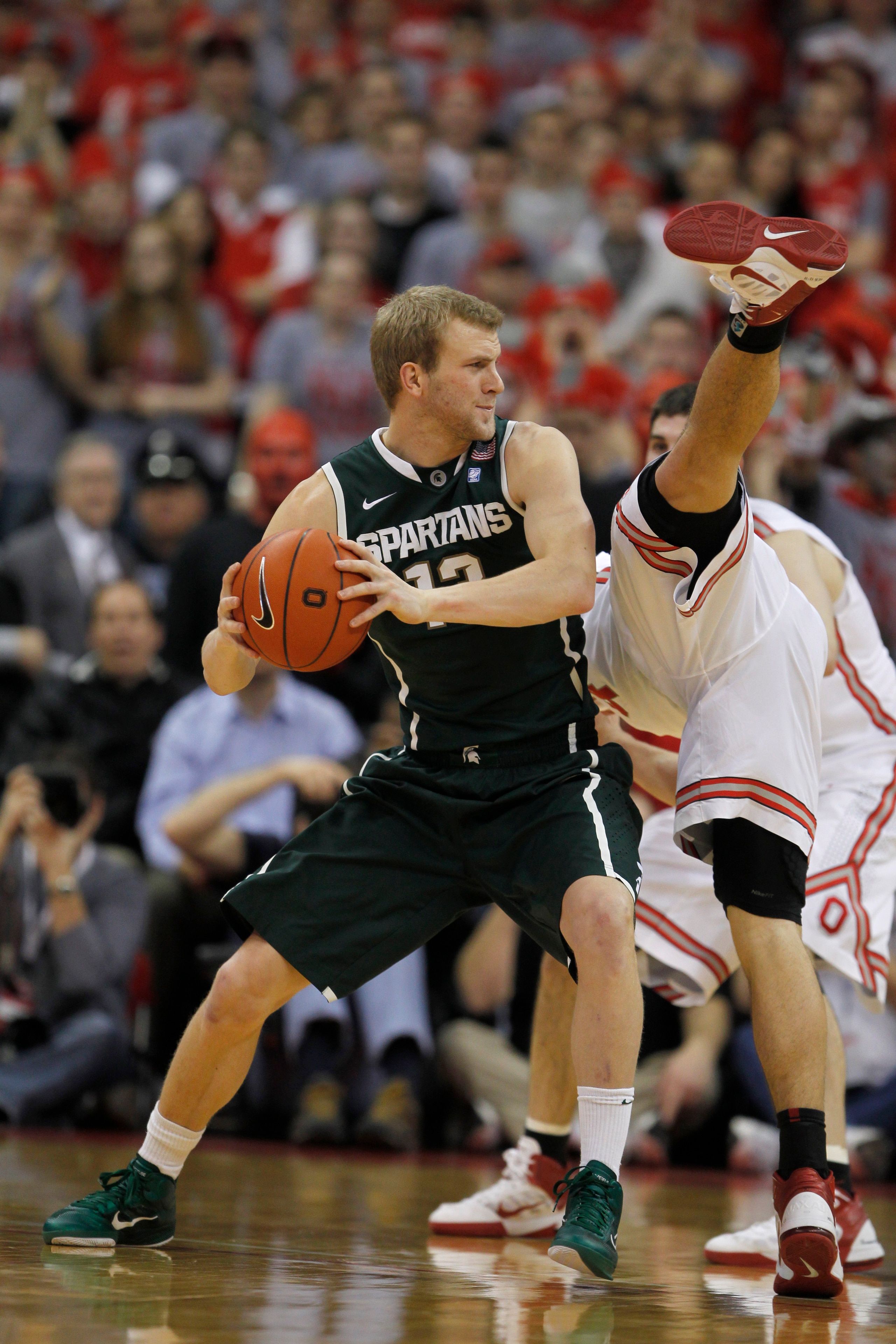 COLUMBUS, OH - FEBRUARY 15:  Austin Thornton #13 of the Michigan State Spartans looks for a shot while playing the Ohio State Buckeyes on February 15, 2011 at Value City Arena in Columbus, Ohio.  (Photo by Gregory Shamus/Getty Images)
