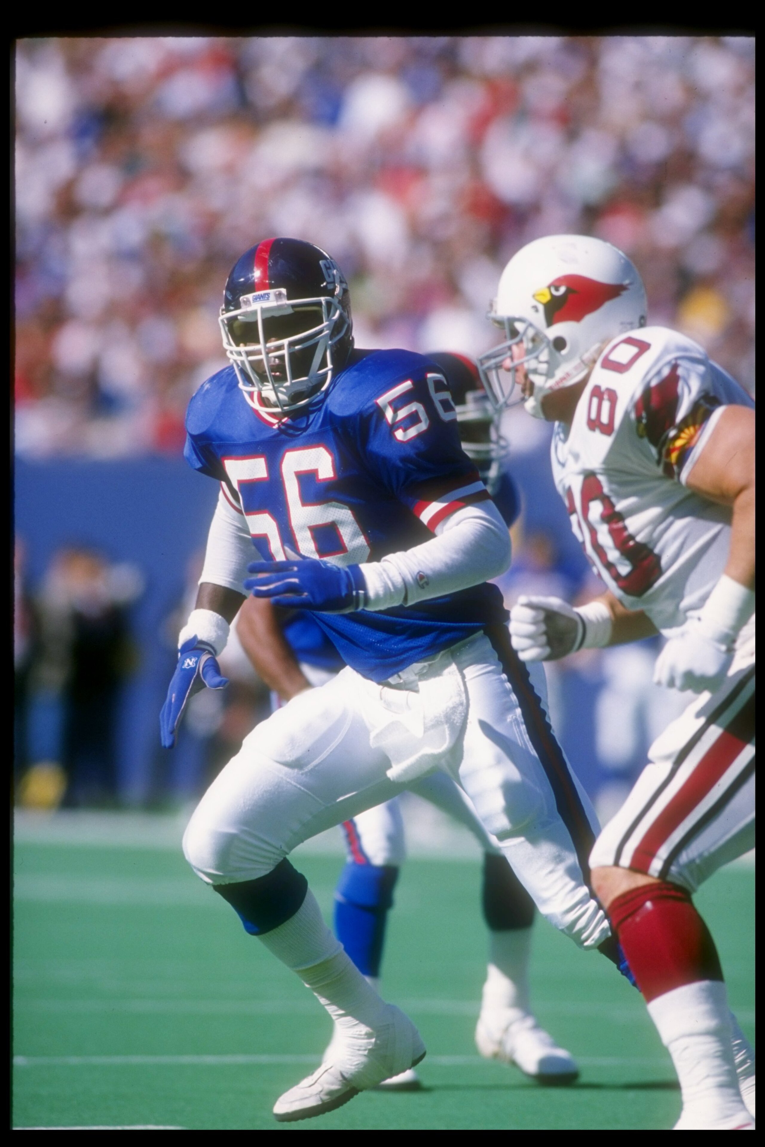 24 Sep 1989:  Linebacker Lawrence Taylor of the New York Giants moves down the field during a game against the Phoenix Cardinals at Giants Stadium in East Rutherford, New Jersey.  The Giants won the game, 35-7. Mandatory Credit: T. G. Higgins  /Allsport