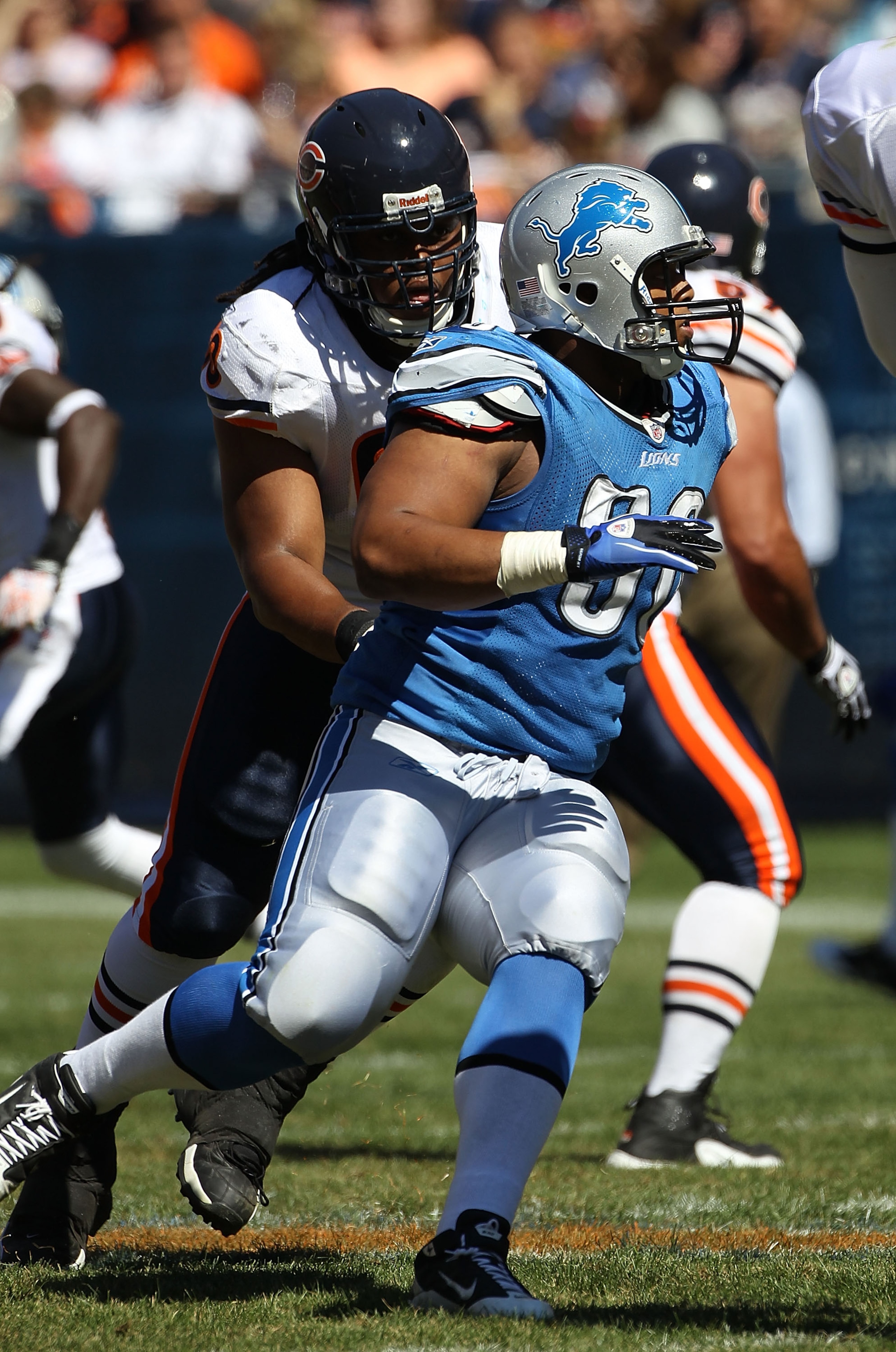 CHICAGO - SEPTEMBER 12: Ndamukong Suh #90 of the Detroit Lions rushes past Lance Louis #60 of the Chicago Bears during the NFL season opening game at Soldier Field on September 12, 2010 in Chicago, Illinois. The Bears defeated the Lions 19-14. (Photo by J