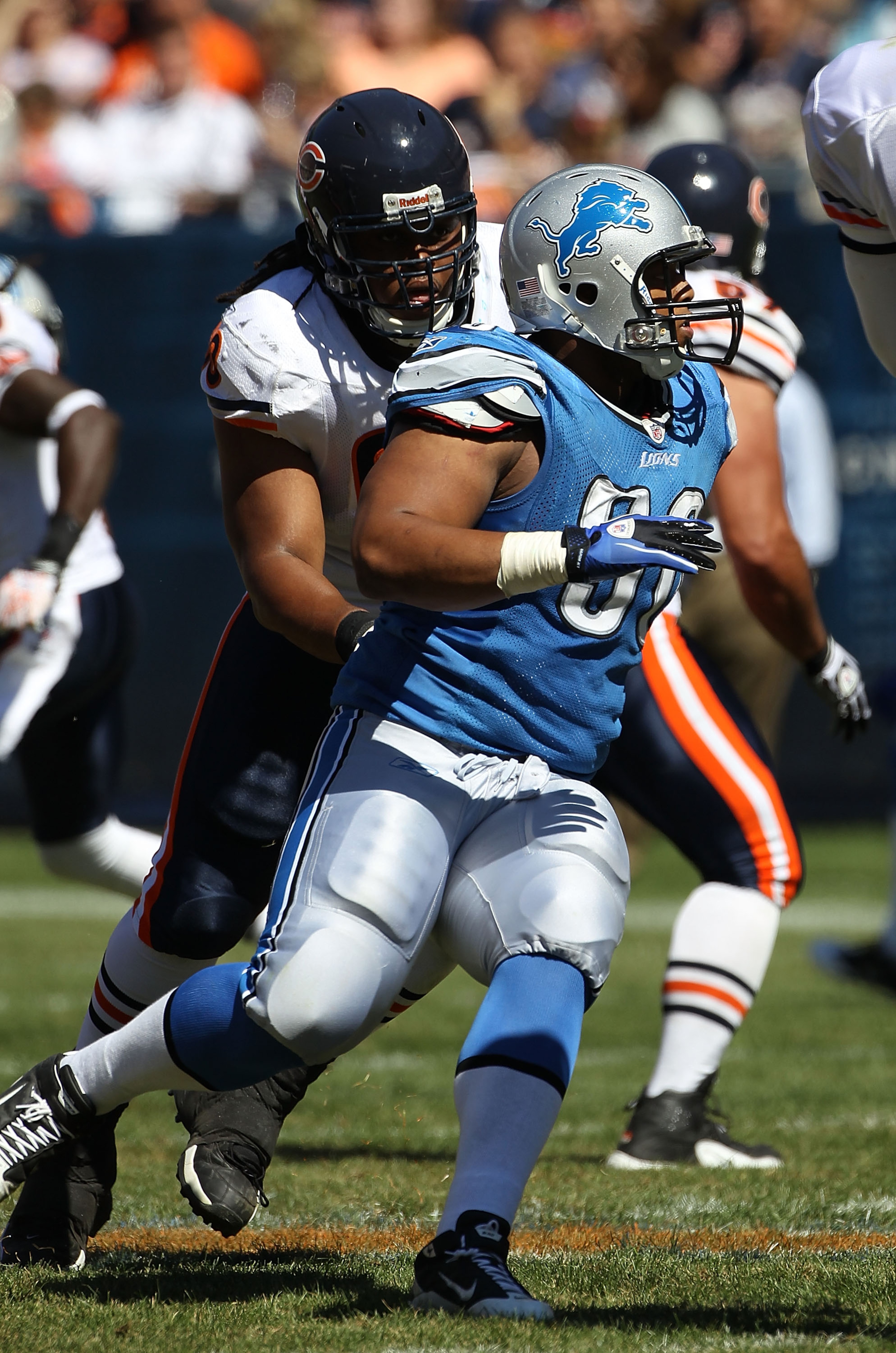 CHICAGO - SEPTEMBER 12: Ndamukong Suh #90 of the Detroit Lions rushes past Lance Louis #60 of the Chicago Bears during the NFL season opening game at Soldier Field on September 12, 2010 in Chicago, Illinois. The Bears defeated the Lions 19-14. (Photo by J